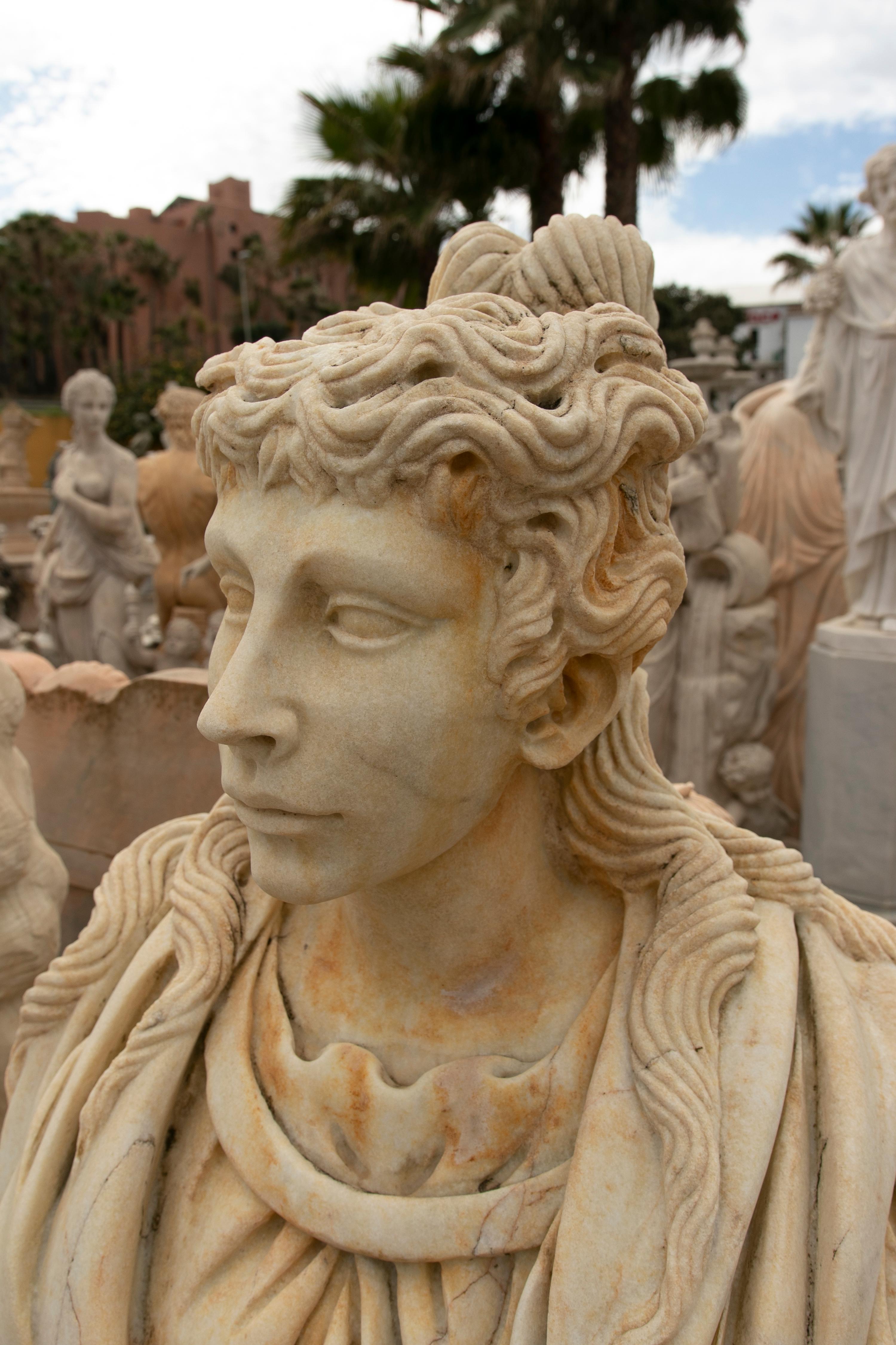 1990s Spanish Hand Carved Aged Macael White Marble Bust of Roman Woman w/ Stola For Sale 1