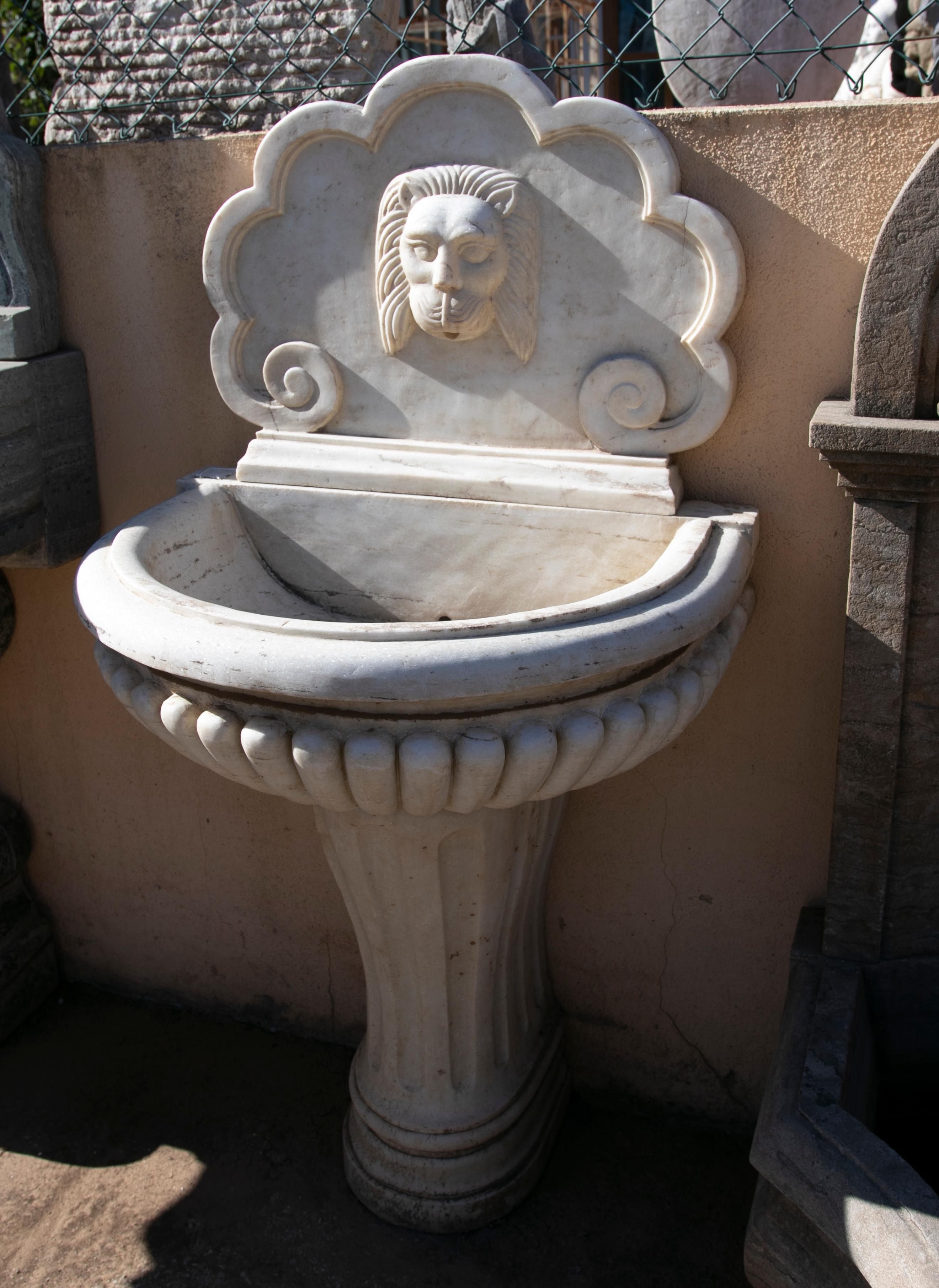 Spanish 1990s Hand Carved Aged Macael White Marble Wall Fountain w/ Mascaron