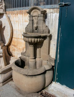 1990s Spanish Hand Carved Grey Sandstone Wall Fountain w/ Trough & Fish Spout
