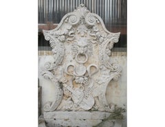 1990s Spanish Hand Carved Travertine Wall Fountain w/ Ornamental Relief