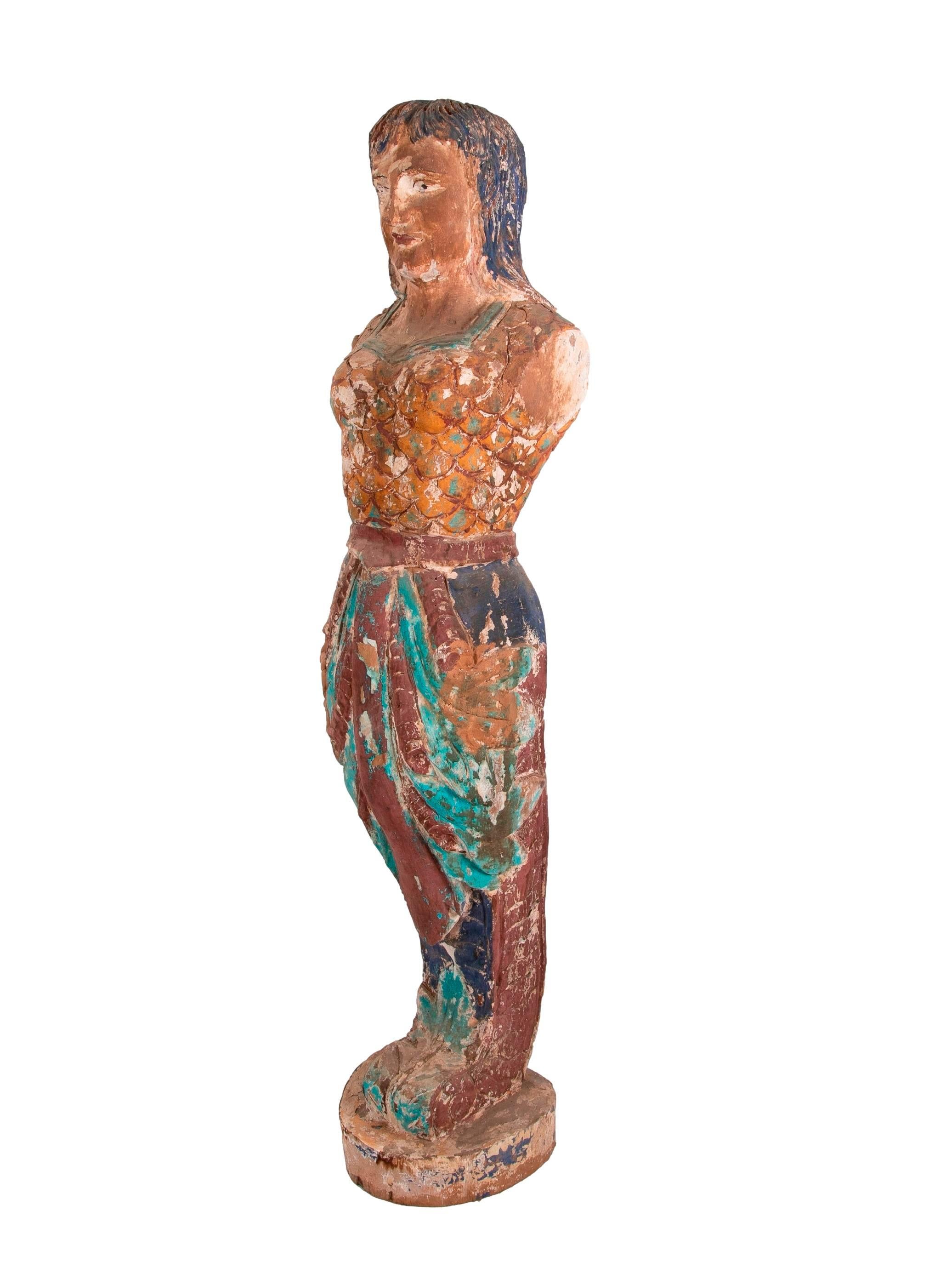 Vintage 1990s Spanish hand carved wooden painted mermaid sculpture, reminiscent of a boats figurehead.