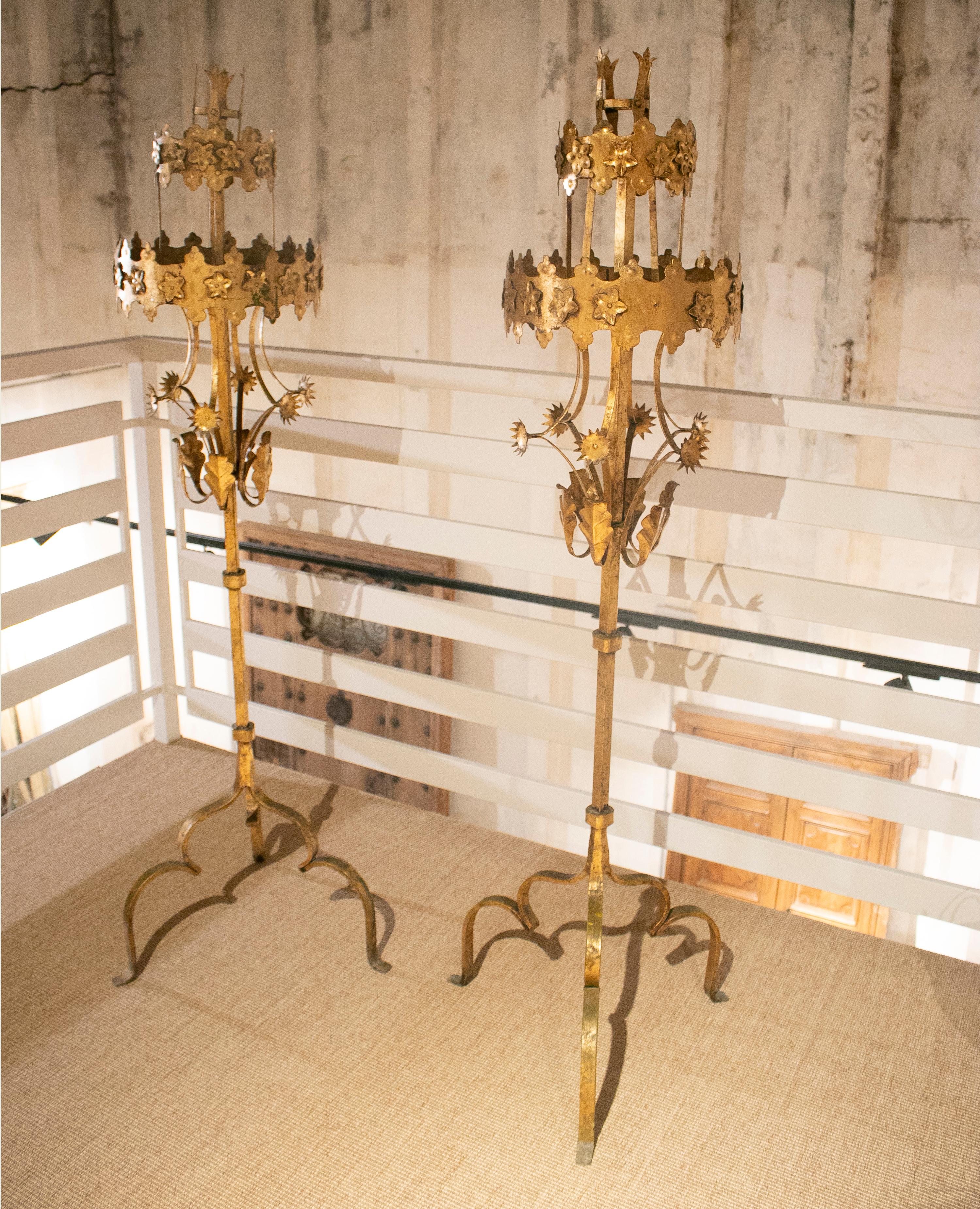 1990s Spanish pair of wrought iron two-tier tall candle stand.