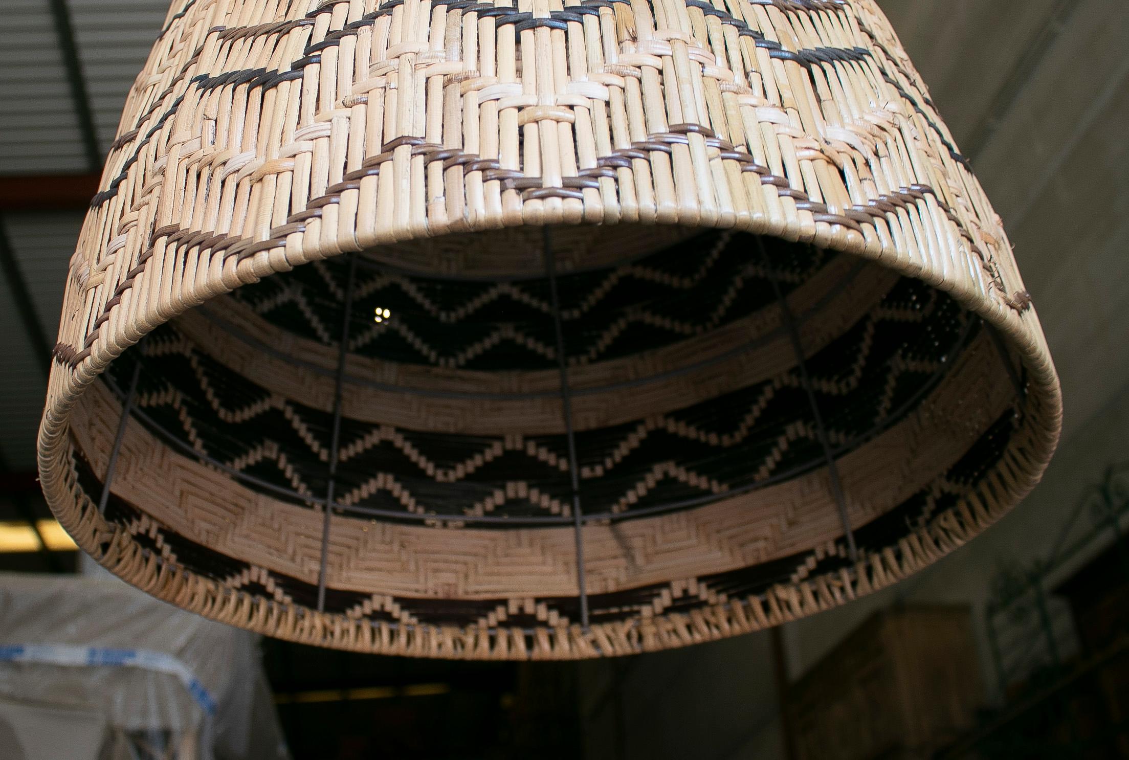 Vintage 1990s Spanish woven wicker hanging ceiling lamp.
