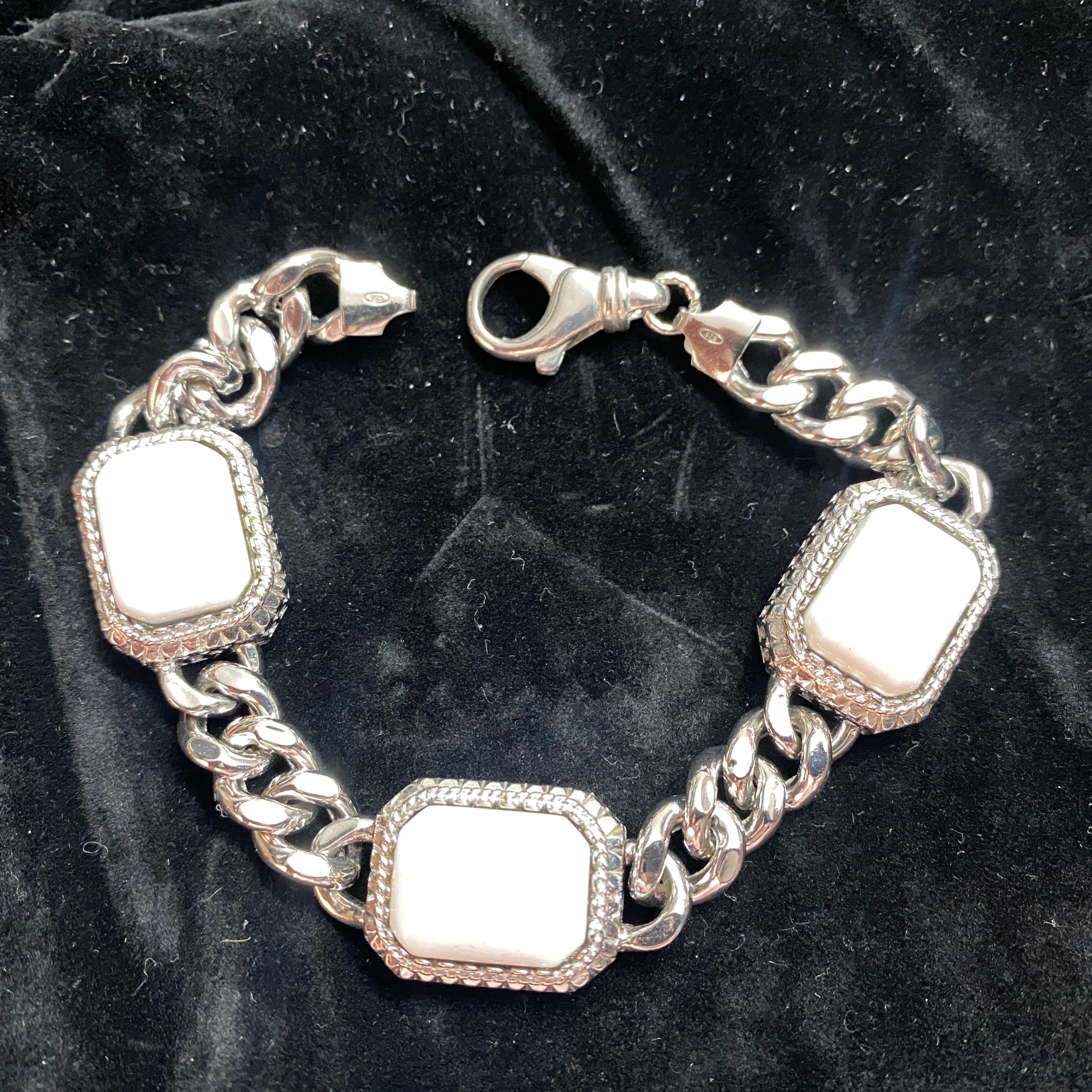 An high quality sterling silver and rectangular white agate cabochon designed by Lucio Cestelli and manufactured in Italy by Anomis. Totally hand-crafted like a jewel. It's never worn. This vintage bracelet made with sterling silver and featuring