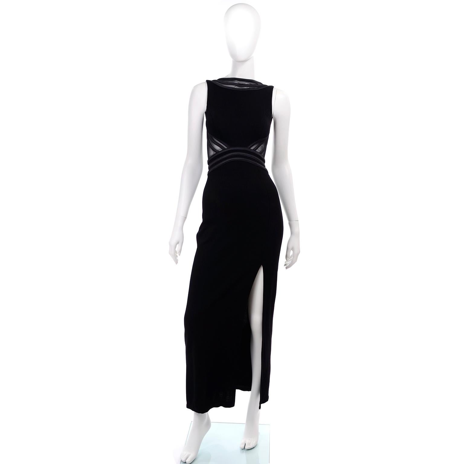 This Tadashi Shoji vintage dress is stunning with its mesh inserts and high slit.  It was designed in the 1990's and is a good example of Tadashi's earlier designs with a flare for the dramatic in a subtle way!  This black crepe dress is piped in