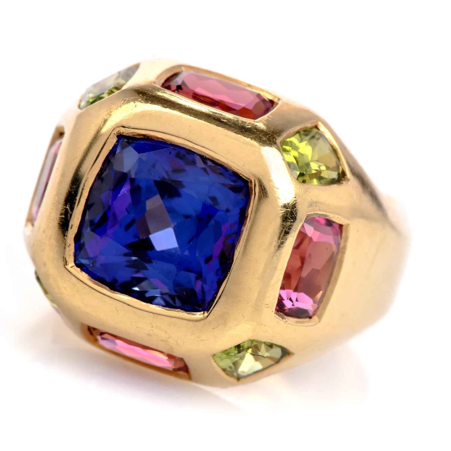 Estate Tanzanite Tourmaline Statement Ring

Forged from 18-karat gold, it boasts a magnificent  approx 6.00 carat natural Tanzanite at its heart. The cushion-cut gemstone emanates a deep violet-blue hue, reminiscent of twilight skies.

Encircling