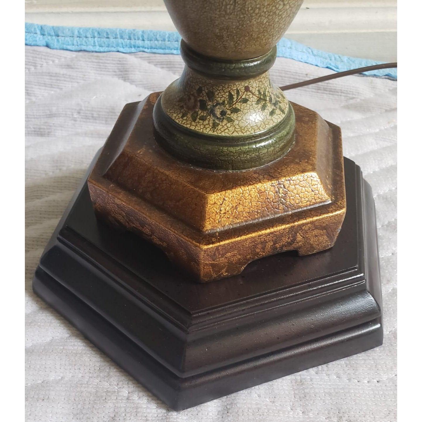 A Famous Bradburn Gallery painted table lamp in excellent condition. Comes with the original signed Bradburn shade. 
Intricately painted lamp in wood.
Lamp measure 8
