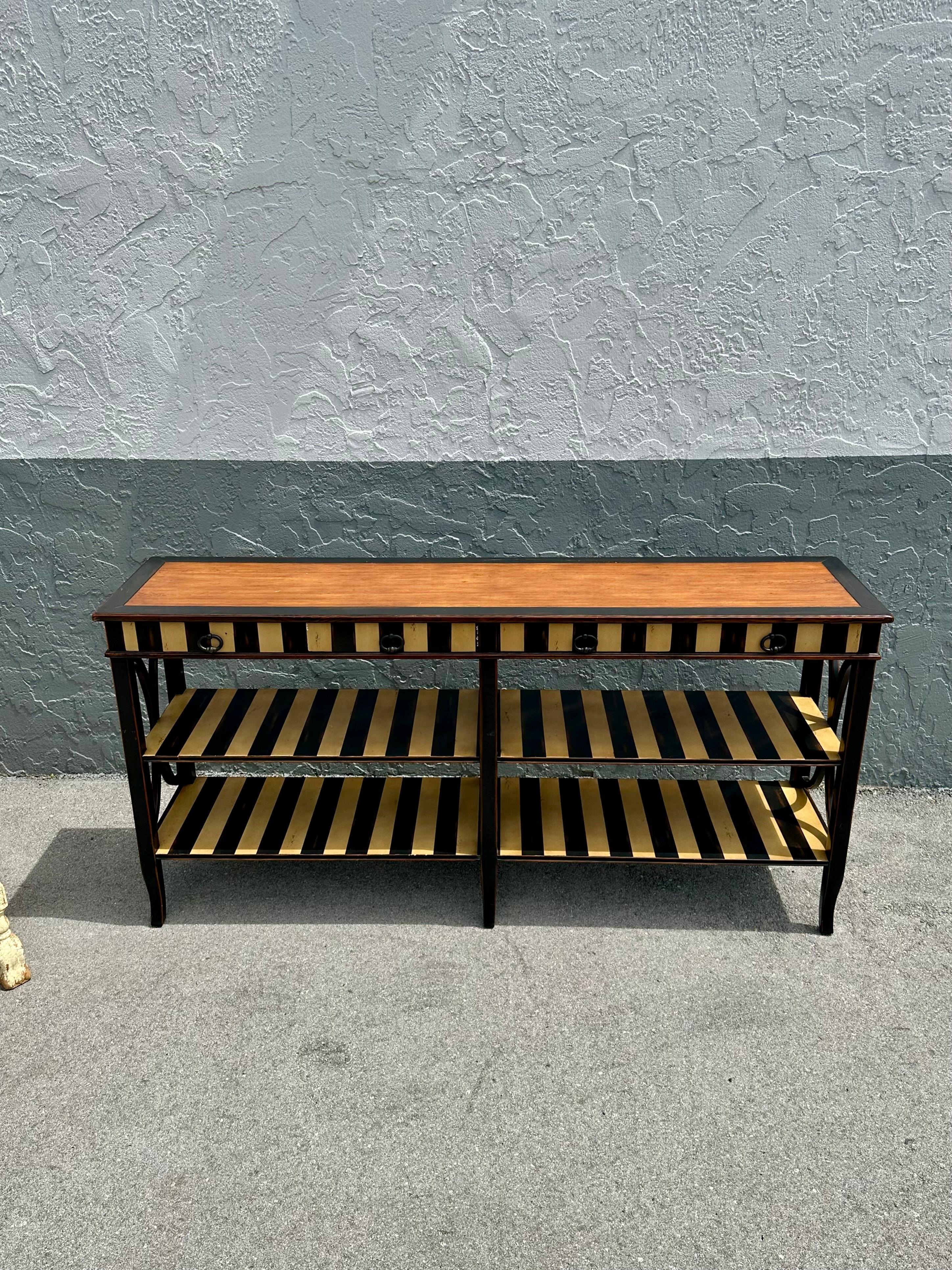 On offer on this occasion is one of the most stunning and rare, three tier painted console table you could hope to find. Outstanding design is exhibited throughout. The beautiful table is statement piece and packed with personality!! Just look at