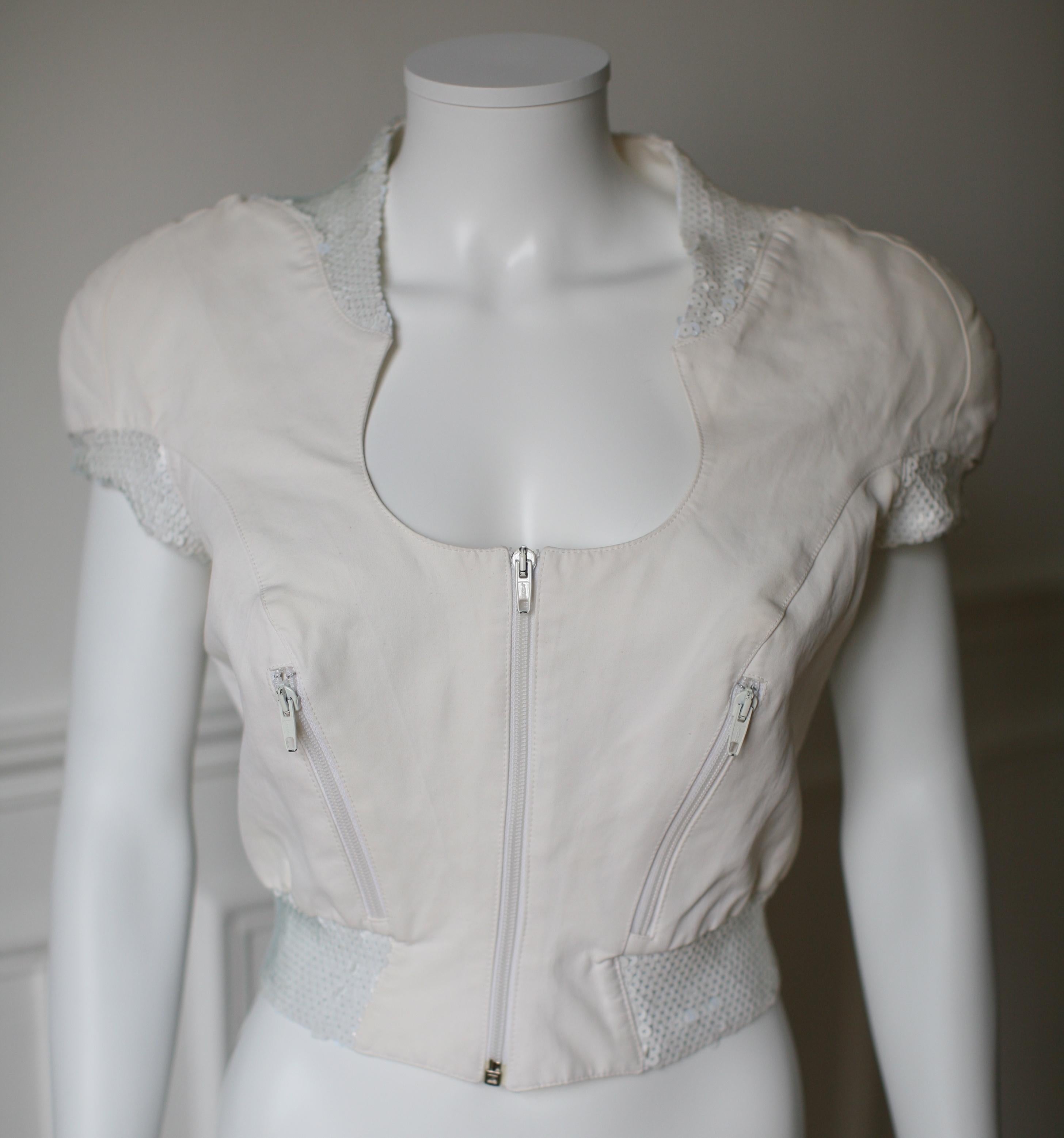 THIERRY MUGLER Activ, made in Italy, circa 90's. 
Cotton top with white sequins and a rounded neckline. 