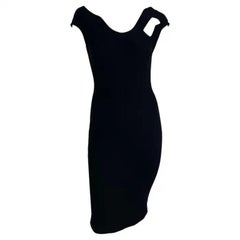 1990 Thierry Mugler - Vestito astratto in maglia nera con taglio a vivo
