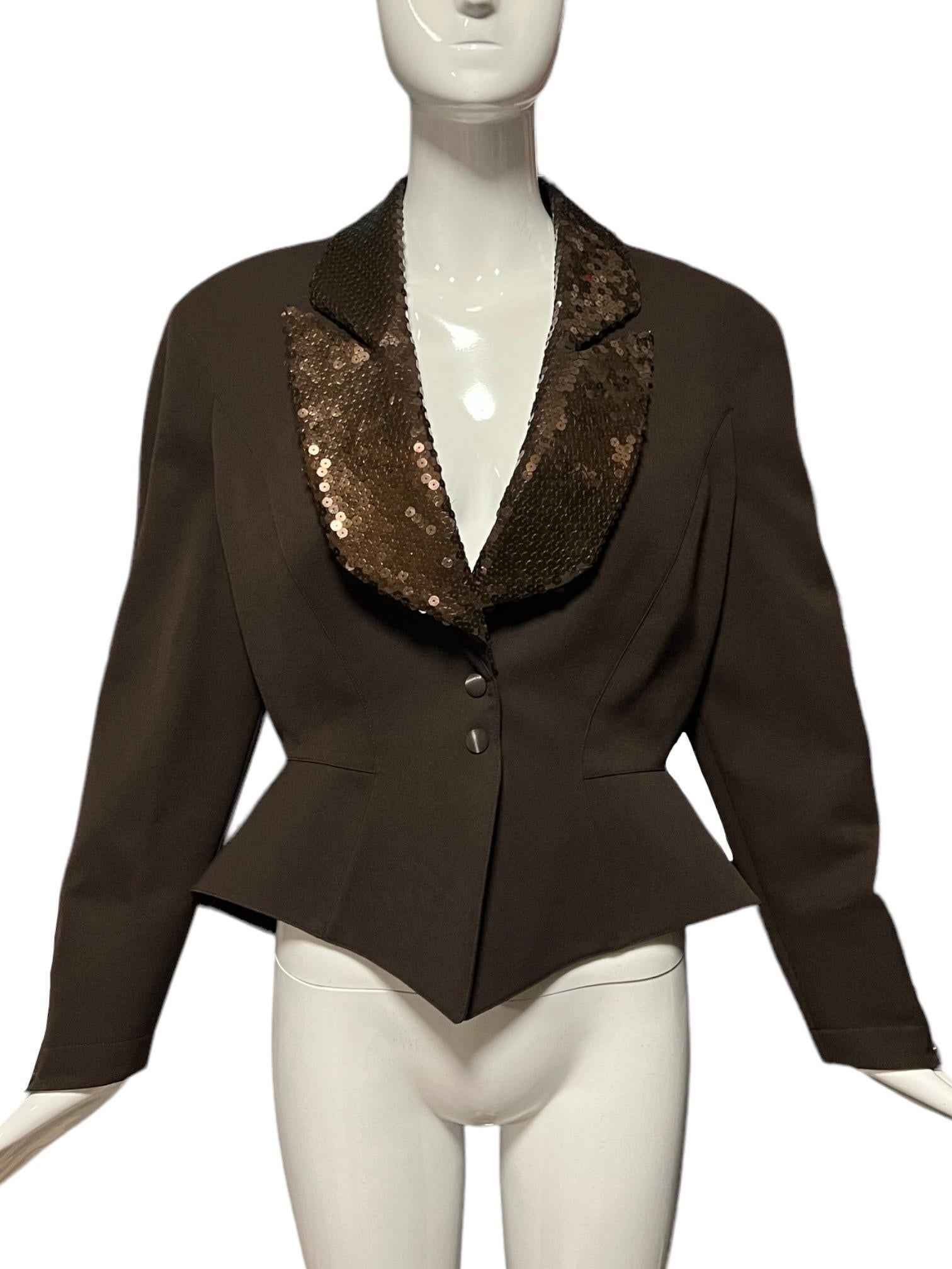 Be glamorous in this vintage 90’s Thierry Mugler chocolate brown wool blazer with an embellished sequin collar.

Size: FR42

Condition: Excellent condition overall. There are a few missing sequins on the collar as pictured. 