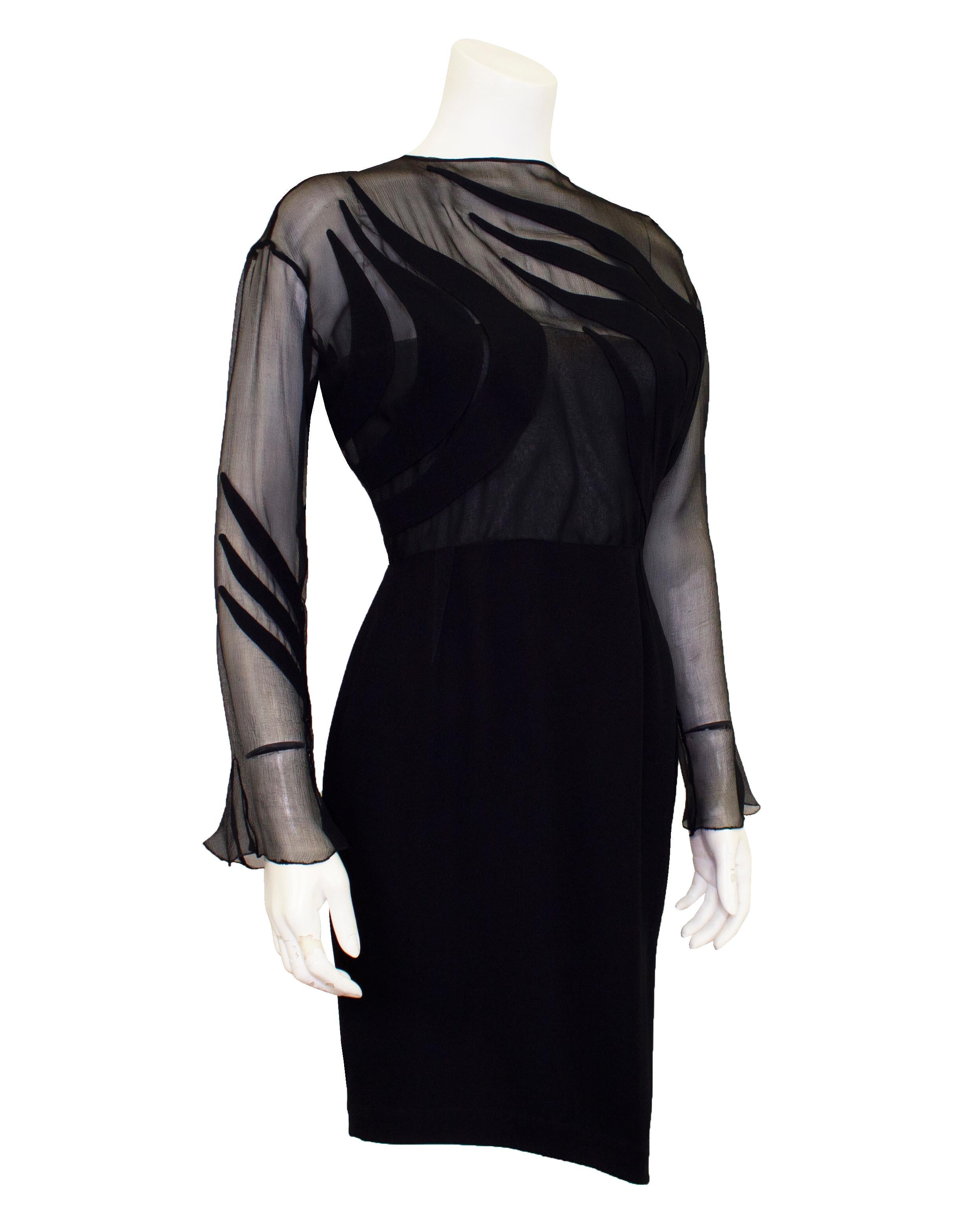 This LBD is the epitome of 1990s Thierry Mugler - ultra fabulous and sexy. The bodice and sleeves are constructed from a sheer black chiffon with black crepe panels throughout that curve and manipulate around the body to keep the bust covered. There