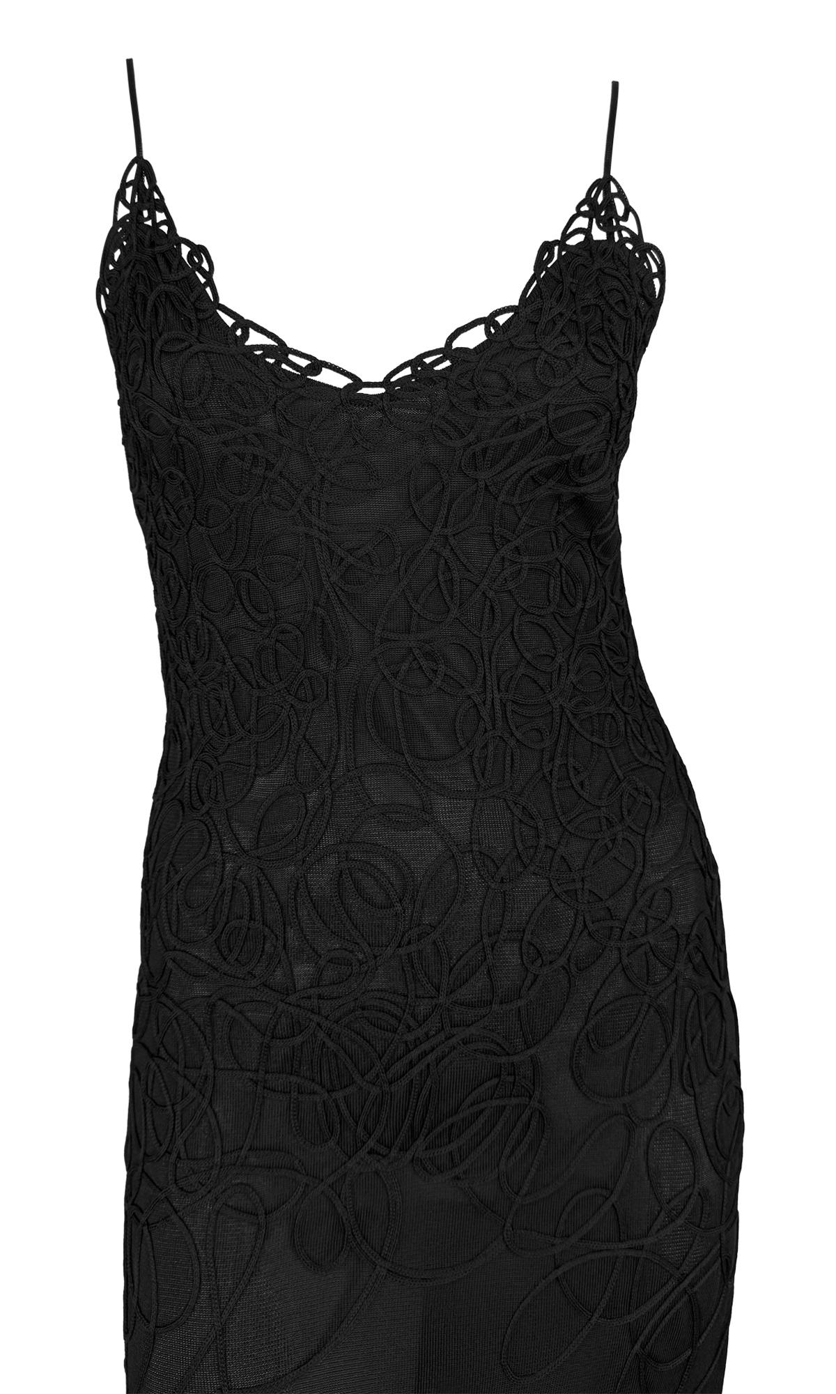 This Thierry Mugler black bodycon gown from the 1990s features a sheer design adorned with intricate abstract swirl embroidered detailing. The gown is sleeveless and elegantly finished with delicate spaghetti straps.

Approximate measurements:
Size