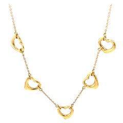 Retro 1990s Tiffany & Co. Elsa Peretti Open Heart Necklace in 18 Karat Yellow Gold