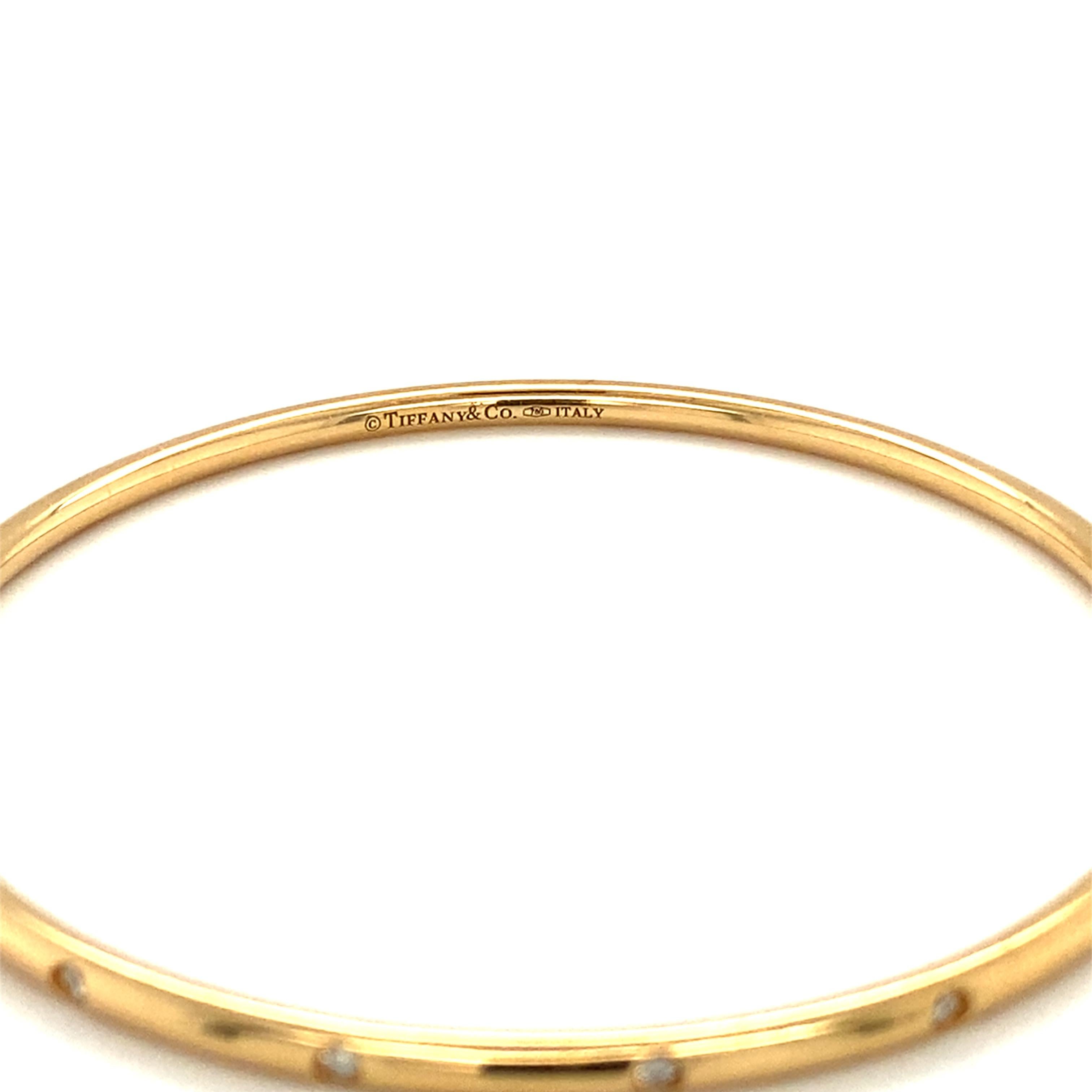 Moderne Bracelet jonc Tiffany & Co en or jaune 18 carats avec diamants 0,16 carat, années 1990 en vente