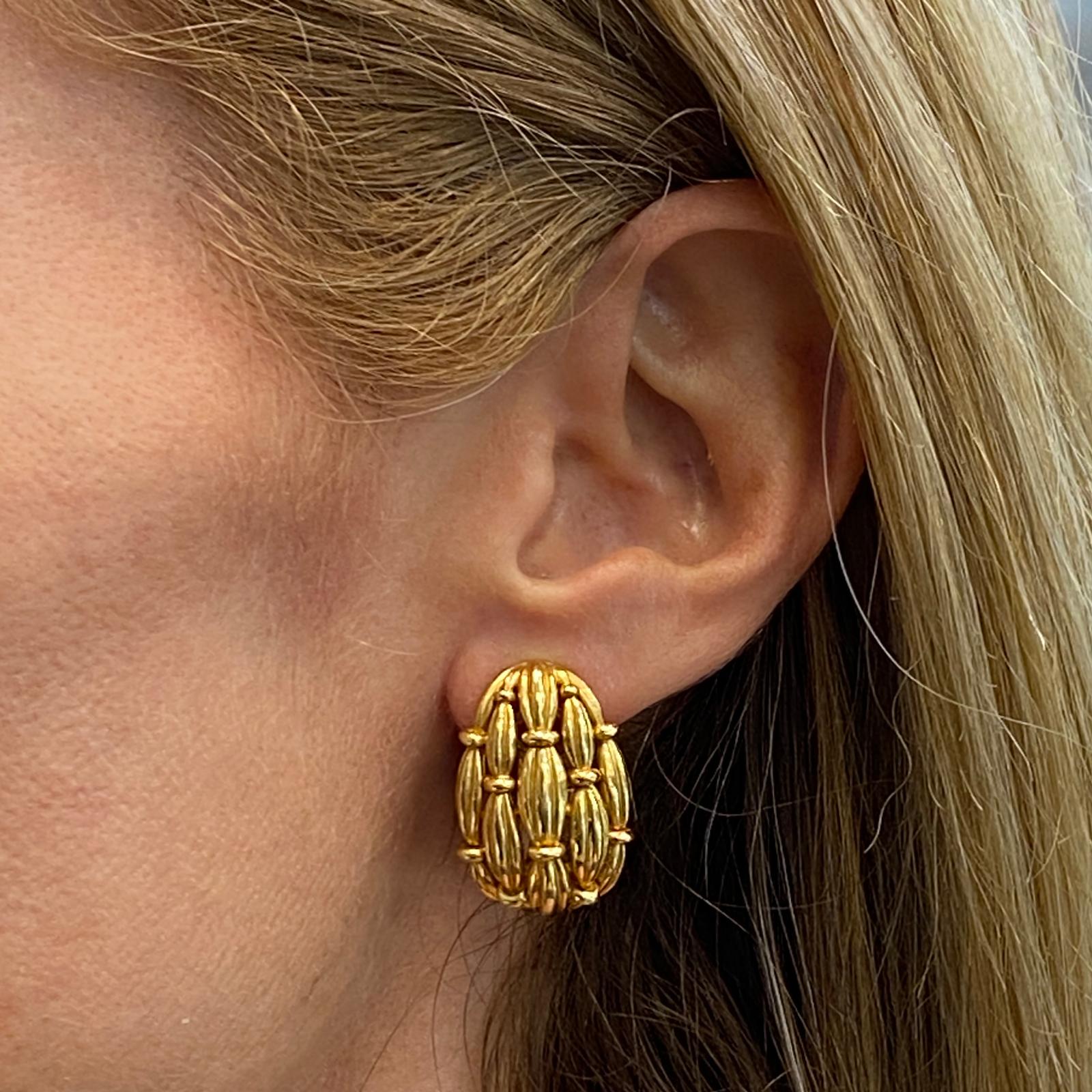 Timeless Tiffany & Co. bamboo earrings fashioned in 18 karat yellow gold. The earrings feature leverbacks, and measure 1.0 x .60 inches, signed 1992 Tiffany & Co. 