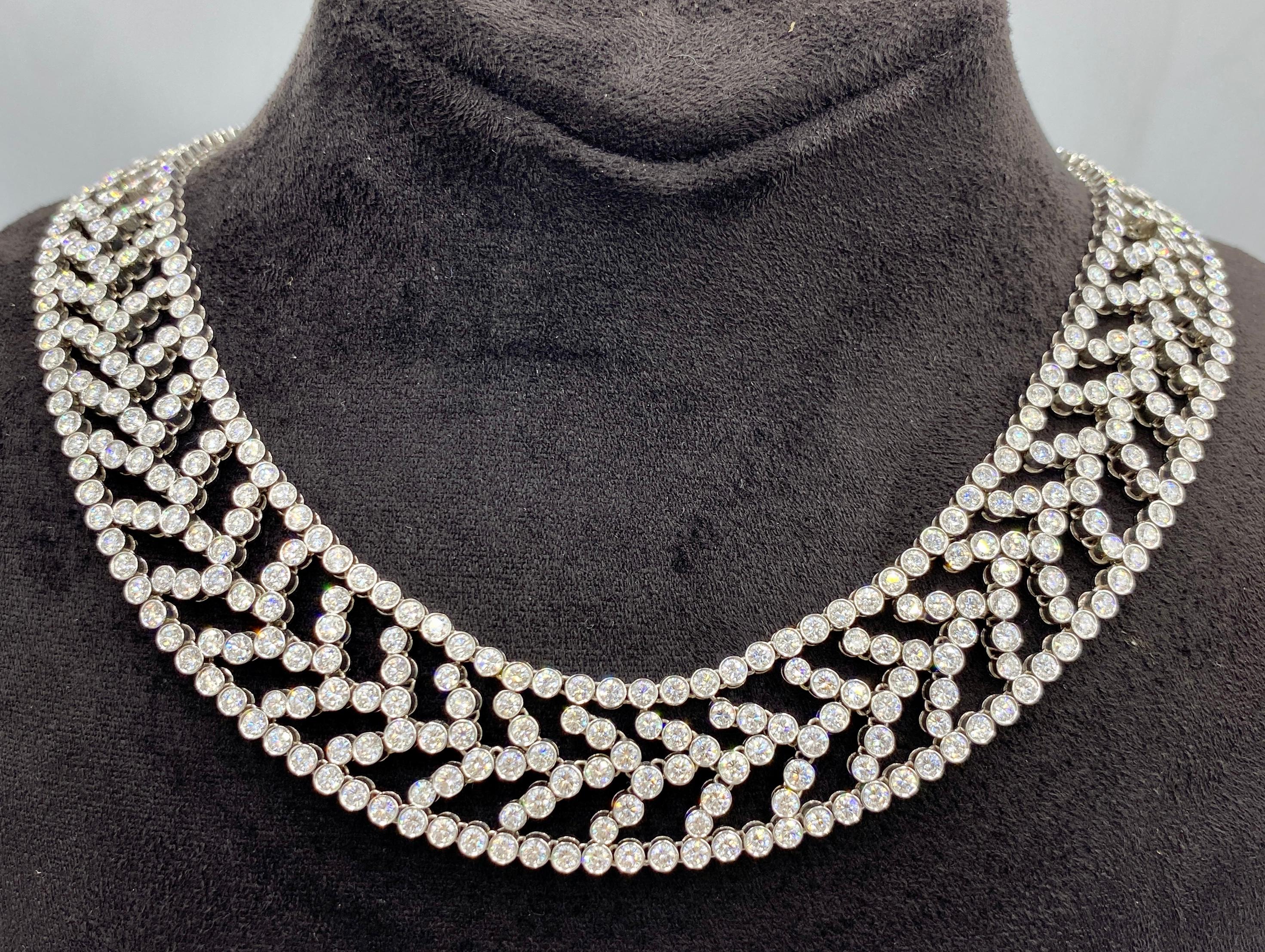 This stunning 1990s Tiffany & Co platinum and diamond choker consists of approximately 31 carats F colour VVS2 diamonds. It is beautifully supple and sits comfortably below the collar bone. The necklace has a matching bracelet which is listed