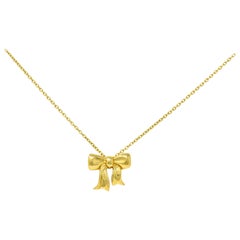 1990s Tiffany & Co. Vintage 18 Karat Gold Bow Pendant Necklace