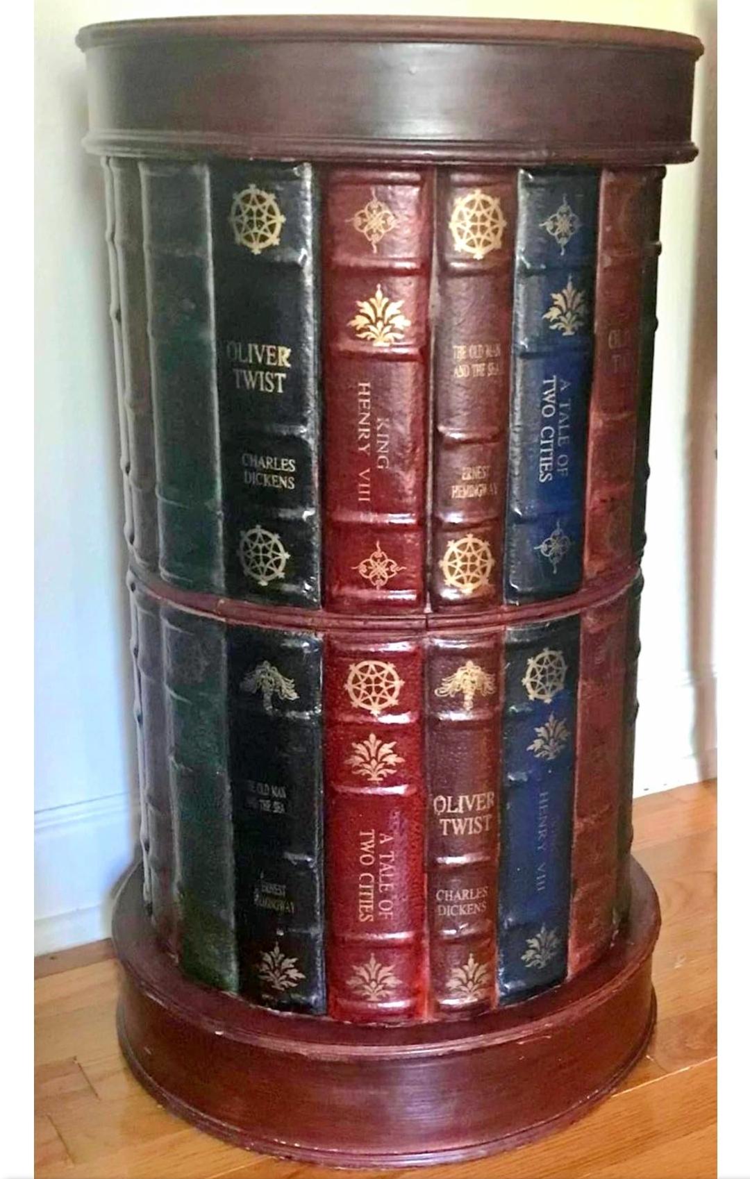 Vintage trompe l'oeil/ stacked book drum table.
In the romantic style of Maitland Smith. 
Hand tooled leather bindings with the English classics written in gold leafing.
Sealed black interior.
Fitted drum lid.
Great for throw pillow or blanket