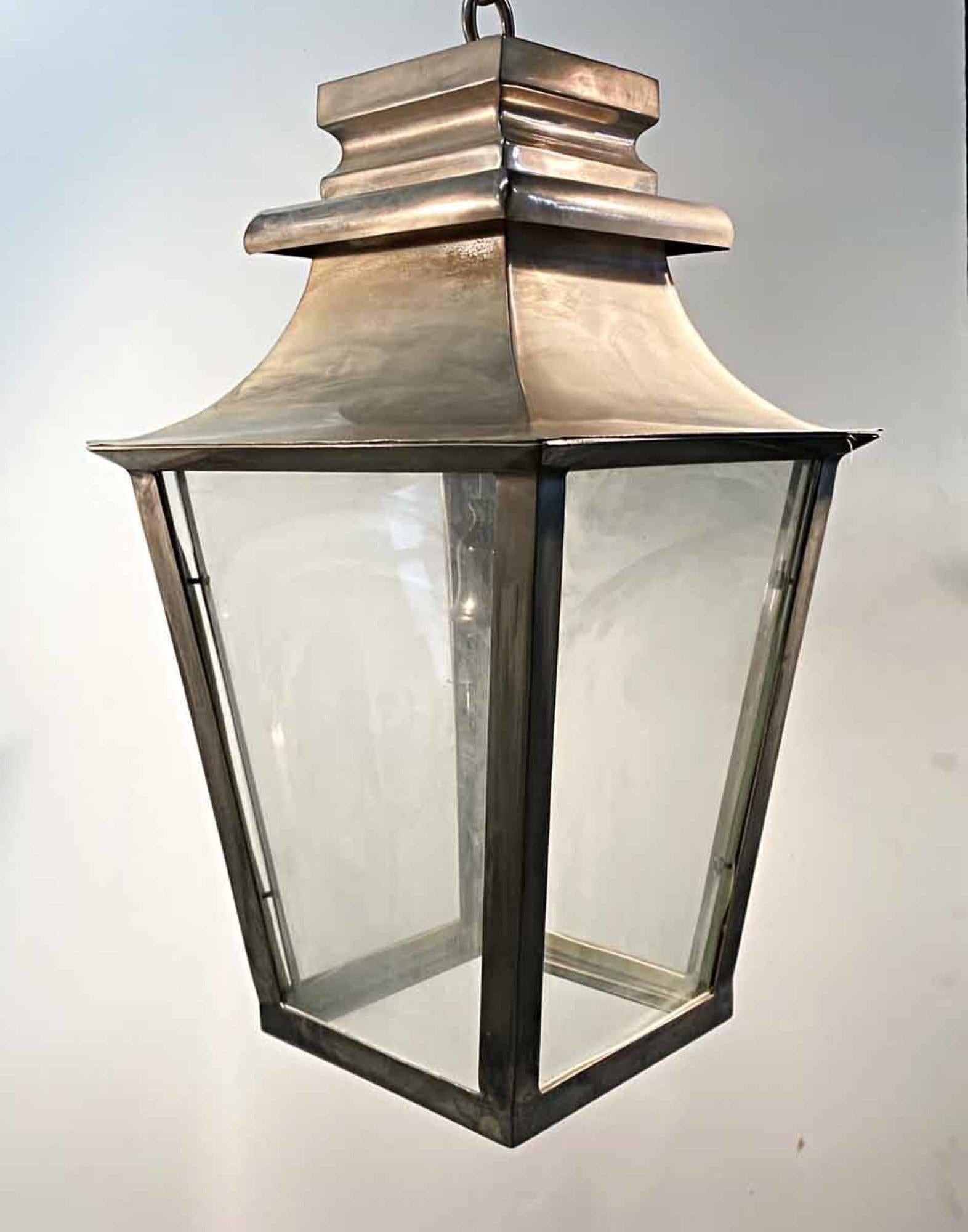 1990s brass with nickel finish single light lantern. Suitable for a porch or entry way. Price includes restoration. Please specify the overall drop needed. This can be seen at our 400 Gilligan St location in Scranton. PA.