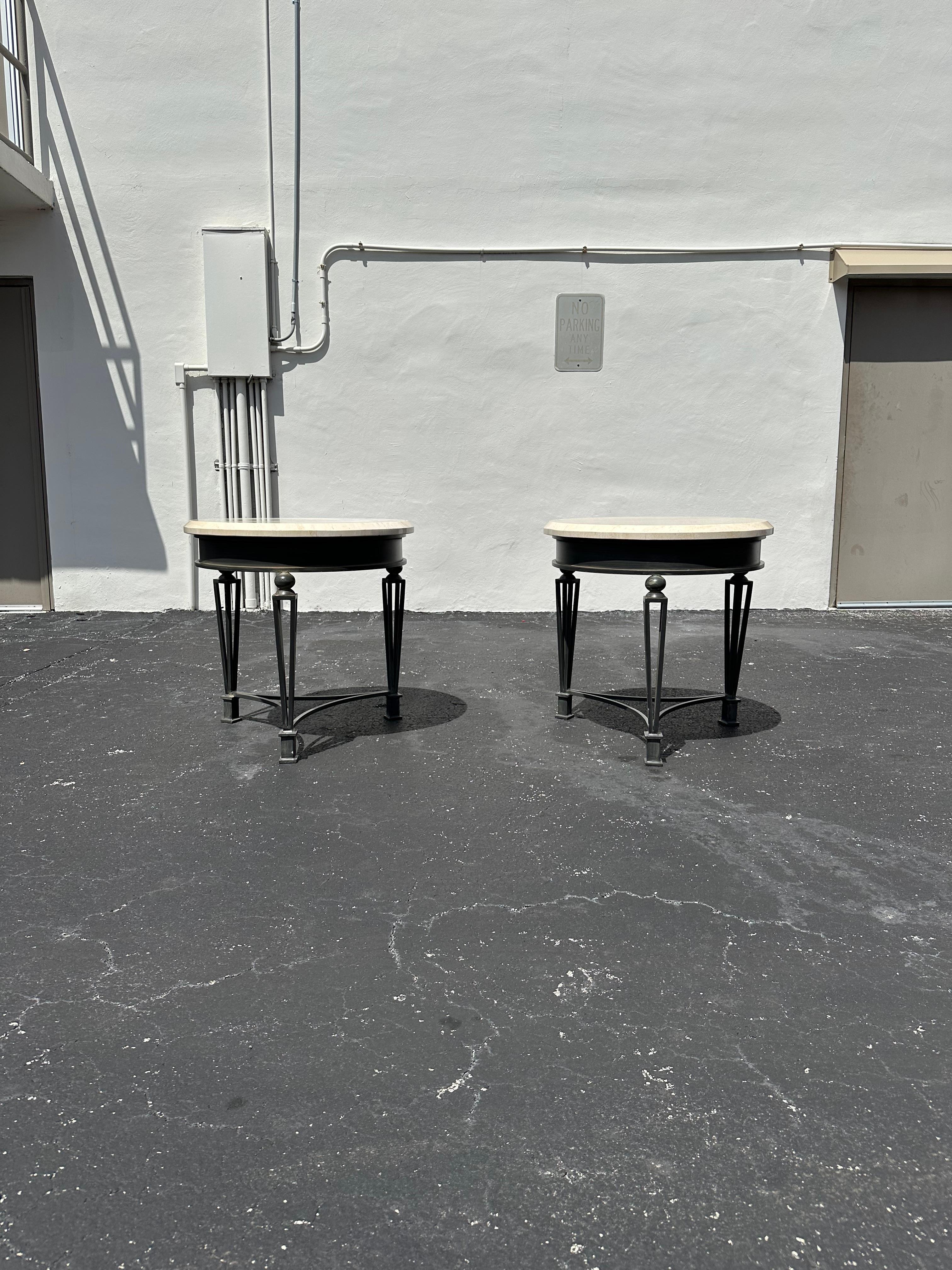 Transport yourself back to the sleek and sophisticated 1990s with this exquisite hand crafted travertine iron tables. The ultra rare tables gives an air of culture and refinement. Outstanding design is exhibited throughout. The tables are statement