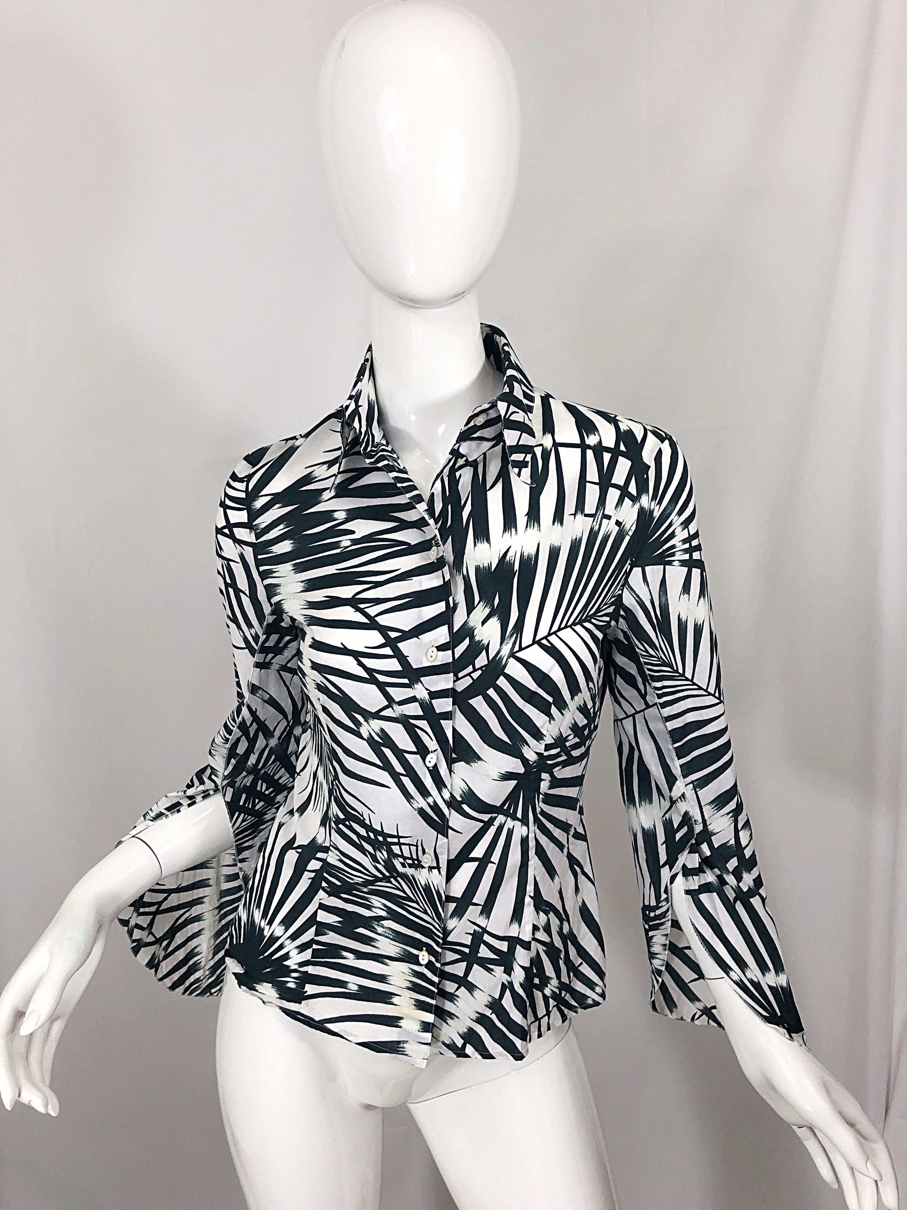 Chic early 2000s Y2K vintage VALENTINO black and white soft cotton button up long bell sleeve blouse! Features a unique tropical palm leave print throughout. Slashed bell sleeves offer just the right amount of flare. Buttons up the front. Can easily