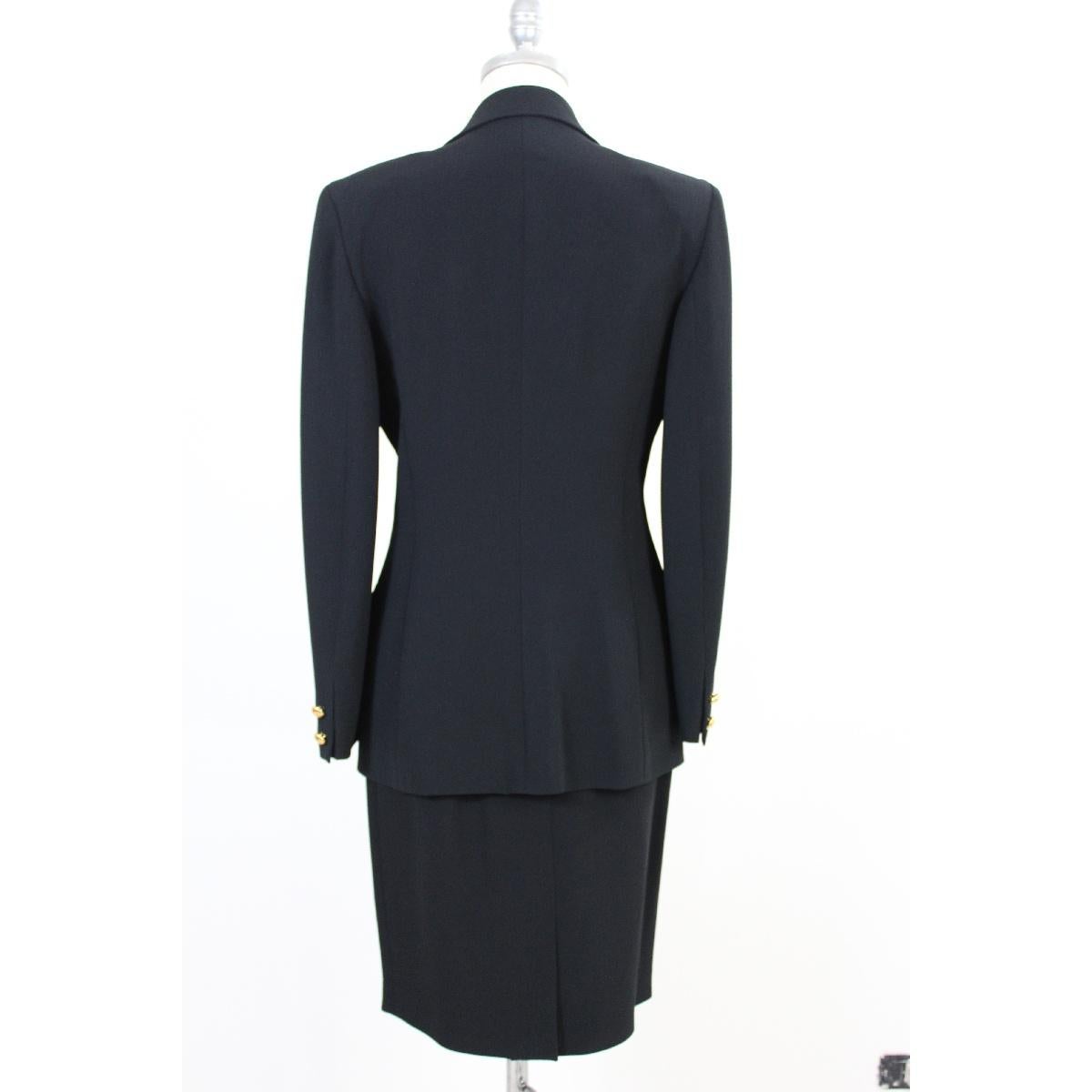 Valentino vintage skirt suit 90s, new with label. Black color. Gold buttons with Valentino symbol. Pair of spare buttons inside the jacket. Composition 53% acetate e 43% viscose. The jacket and the skirt are lined. Made in Italy.

Size 42 It 8 Us 10