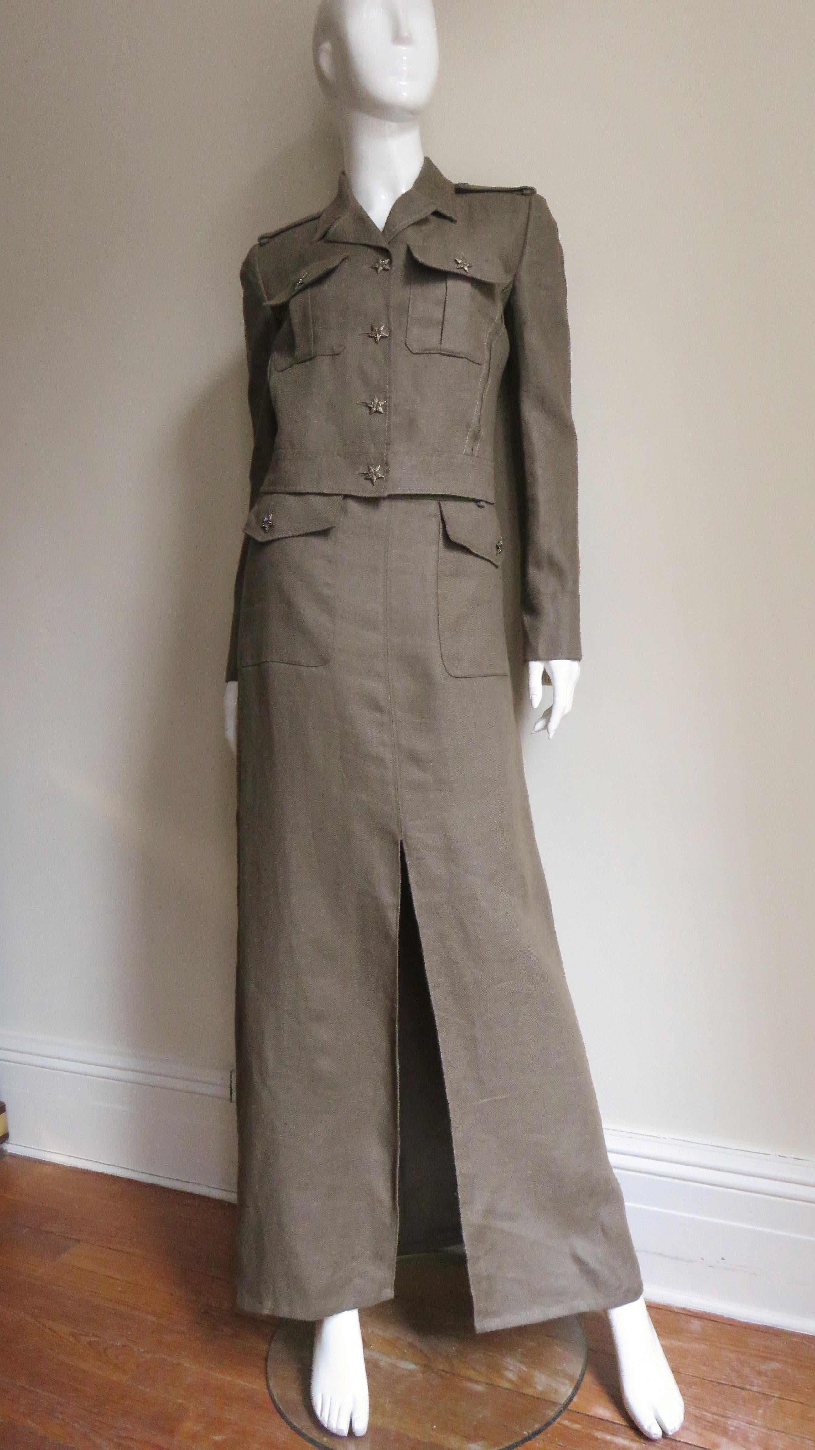 A great olive linen set from Valentino.  It consists of a hip length jean style jacket with front chest patch pockets with flaps and small notched lapel collar.  There are epaulets on the shoulders, long cuffed sleeves and vertical slot seaming and
