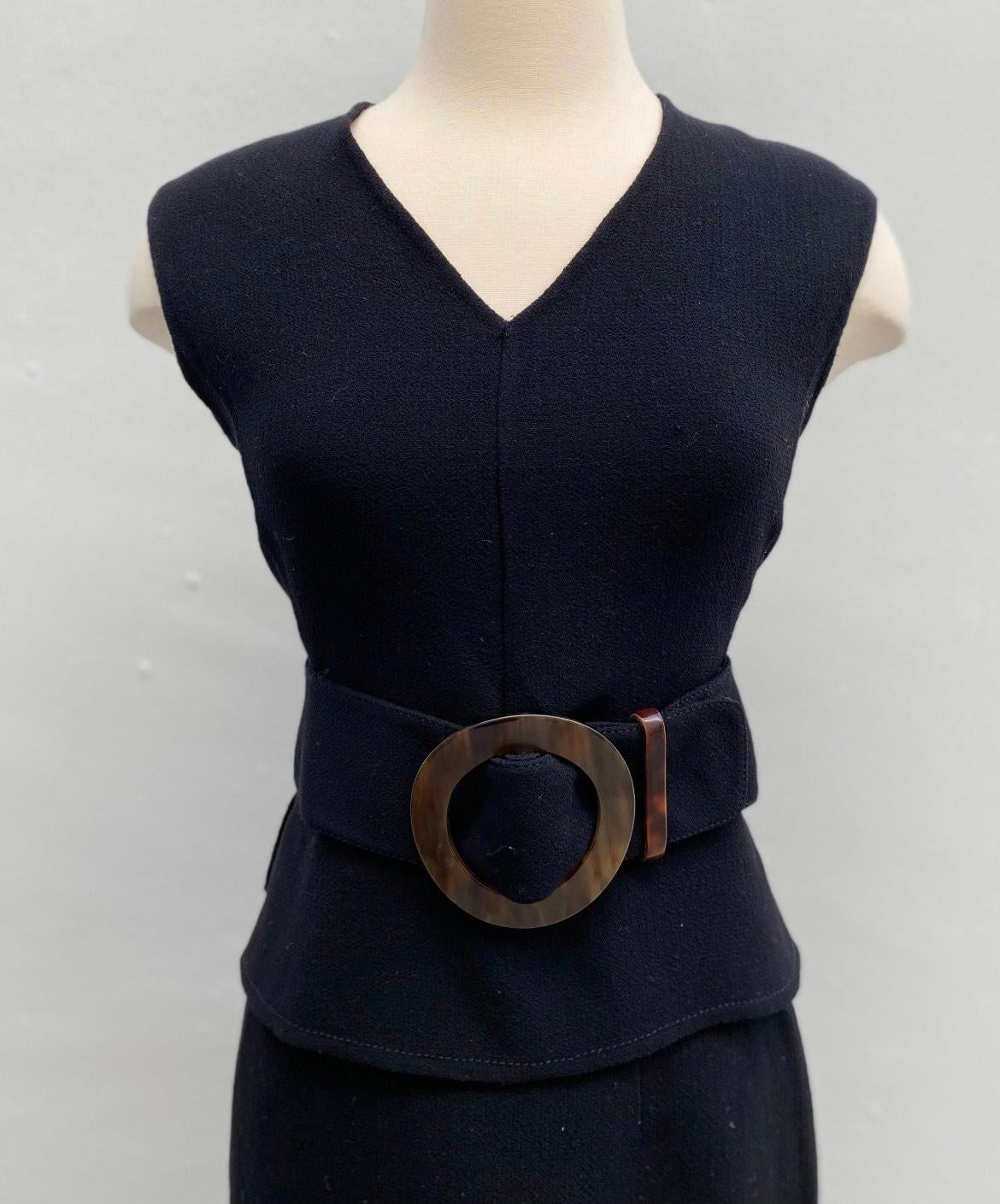 1990s Valentino set of vest style top with a wide matching fabric belt and big round tortoiseshell buckle and mini skirt, back zip up.  Sixtiess style but made in the Nineties.  No fabric label but feels like a light crepe wool, single layer with no