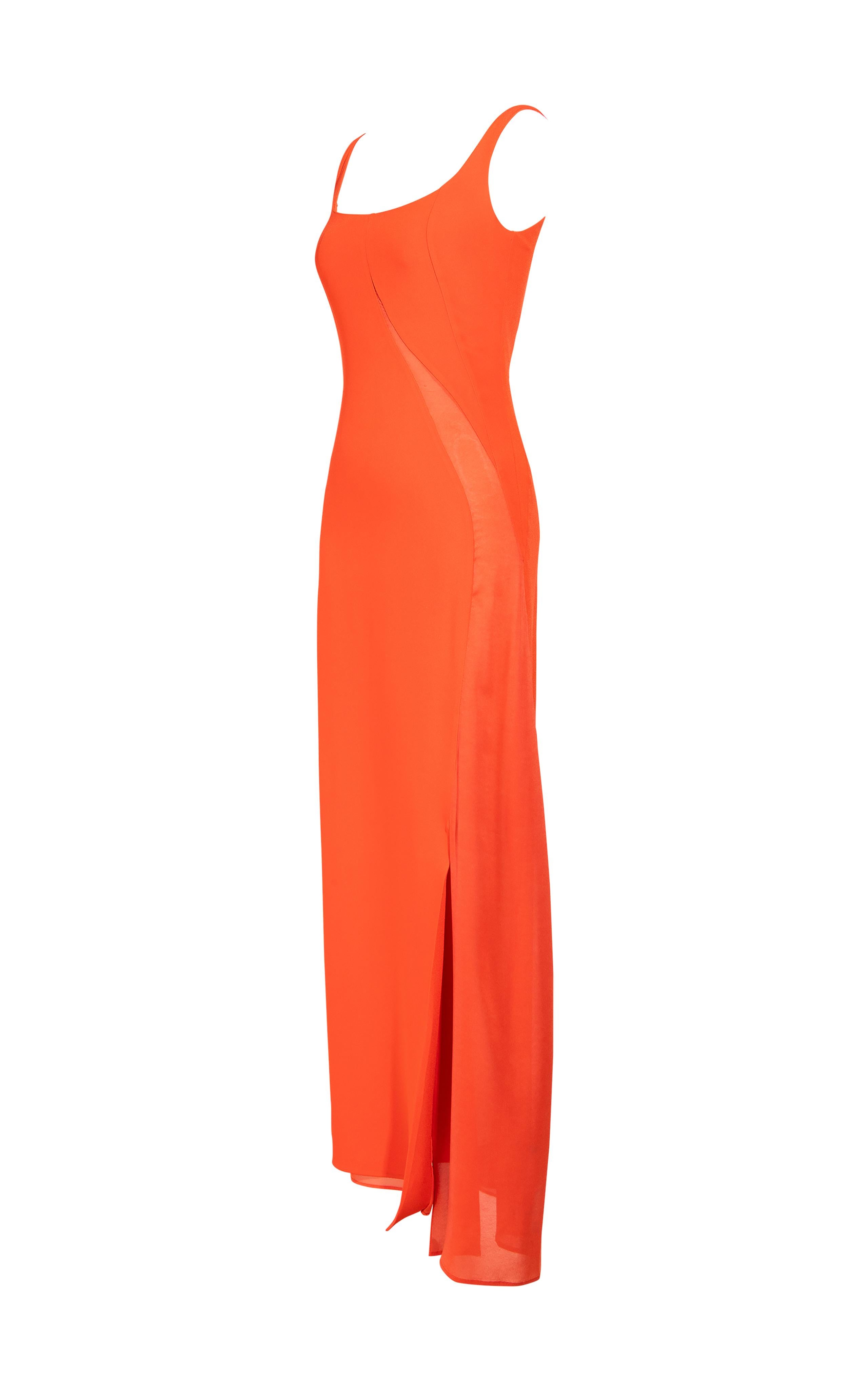 1990's Valentino orange sleeveless gown with semi-sheer curved mesh paneling. Scoop neck gown with back zip closure. Fabric contents illegible; feels like silk blend. 