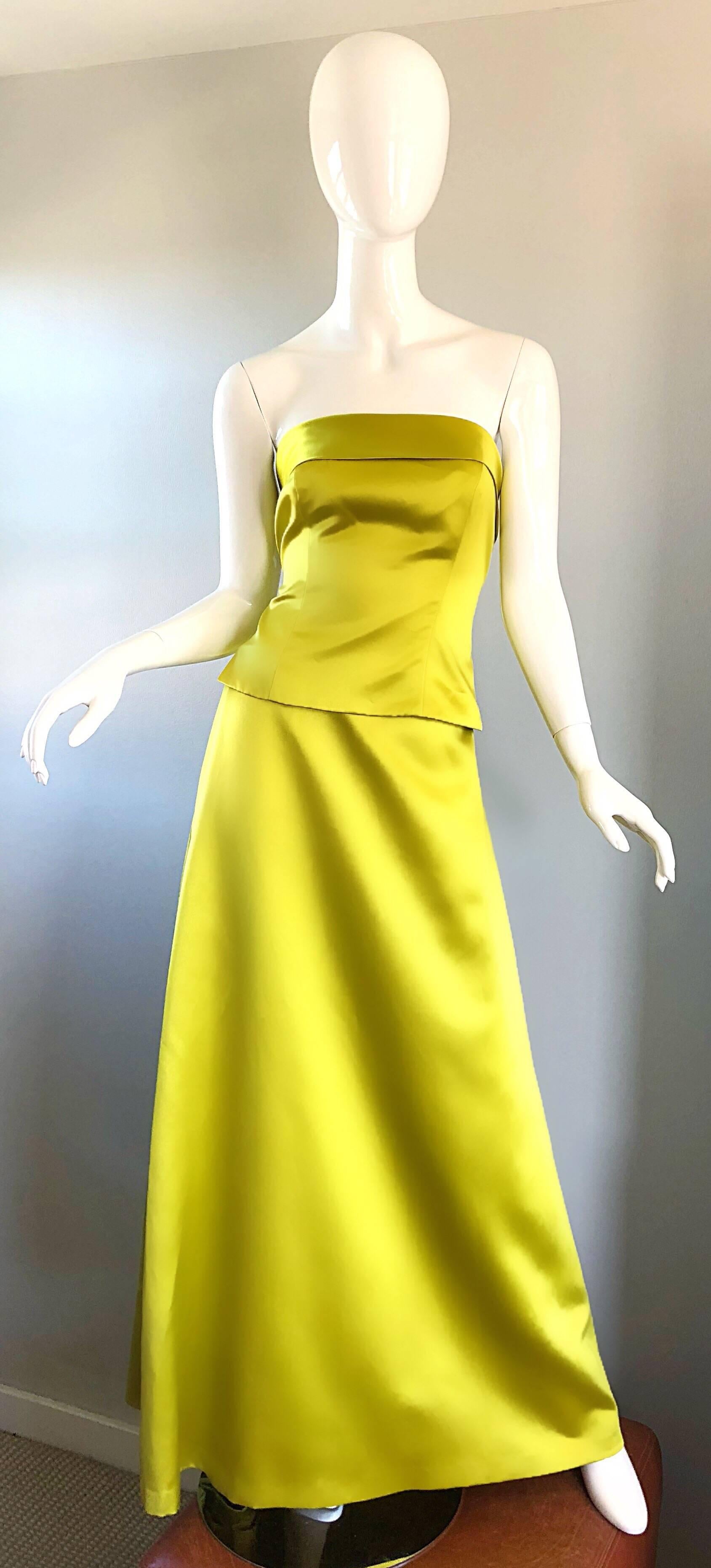 Gorgeous vintage 90s VERA WANG chartreuse yellow/green two piece satin evening gown ensemble! Features a fitted corset with a full hidden zipper up the back with hook-and-eye closures. Flattering forgiving full skirt features a zipper up the side