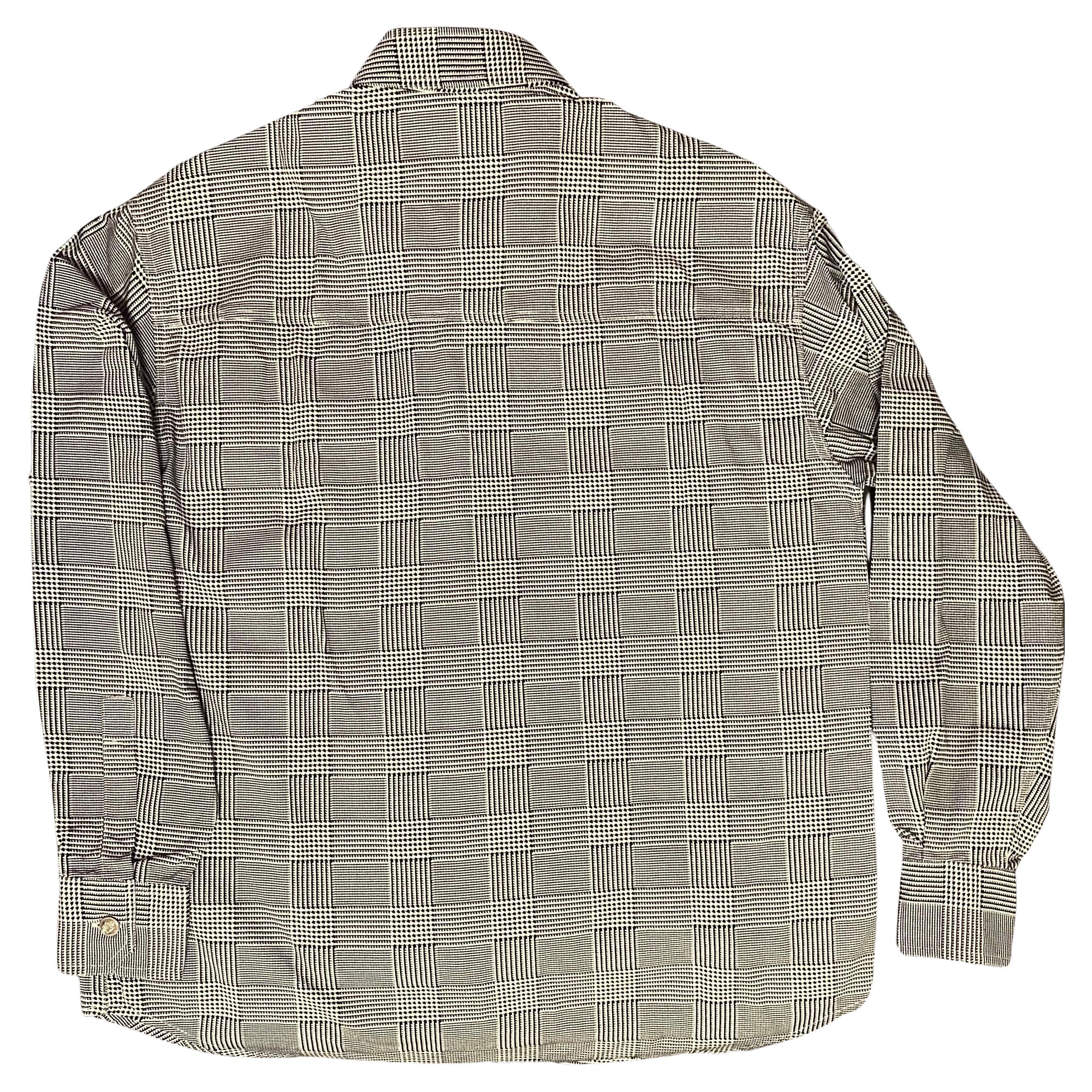 1990s VERSACE Jeans Houndstooth Cotton oversized shirt, long sleeves, Silver tone Medusa buttons, collared neckline, 100% Cotton, Made in Italy

Size: 40 IT - 8UK - 0/2 USA 

Measurements: Please note that the shirt wears baggy as worn in the 90s