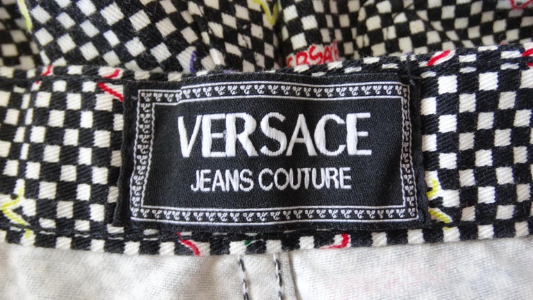 1990s Versace Multi Colored Logo Checkerboard High Waisted Jeans at 1stDibs