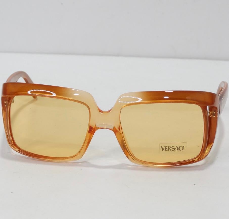 How stunning are these Versace dead stock sunglasses circa 1990s?! The perfect square frame sunglasses in a vibrant and stunning gradient orange color-way. These are the perfect every day sunglasses with a vibrant flare! Match these to a multicolor
