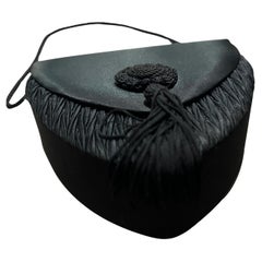 1990s Vintage Black Silk Hand-Bag by Van Cleef & Arpels