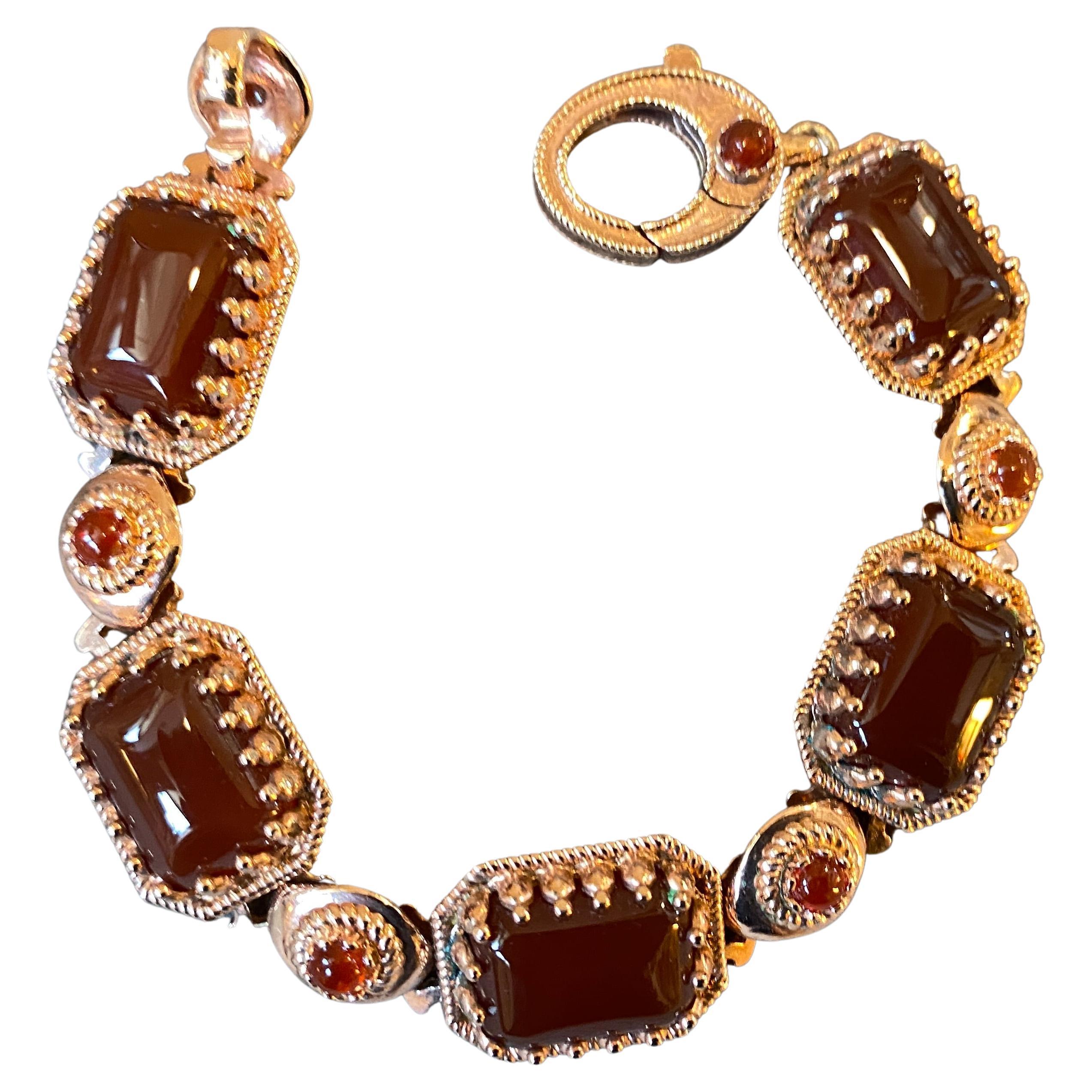 An amazing bracelet made in Italy in the Nineties, it's in perfect condition probably never worn. High quality bronze and cabochon carnelian gives it a jewel look.