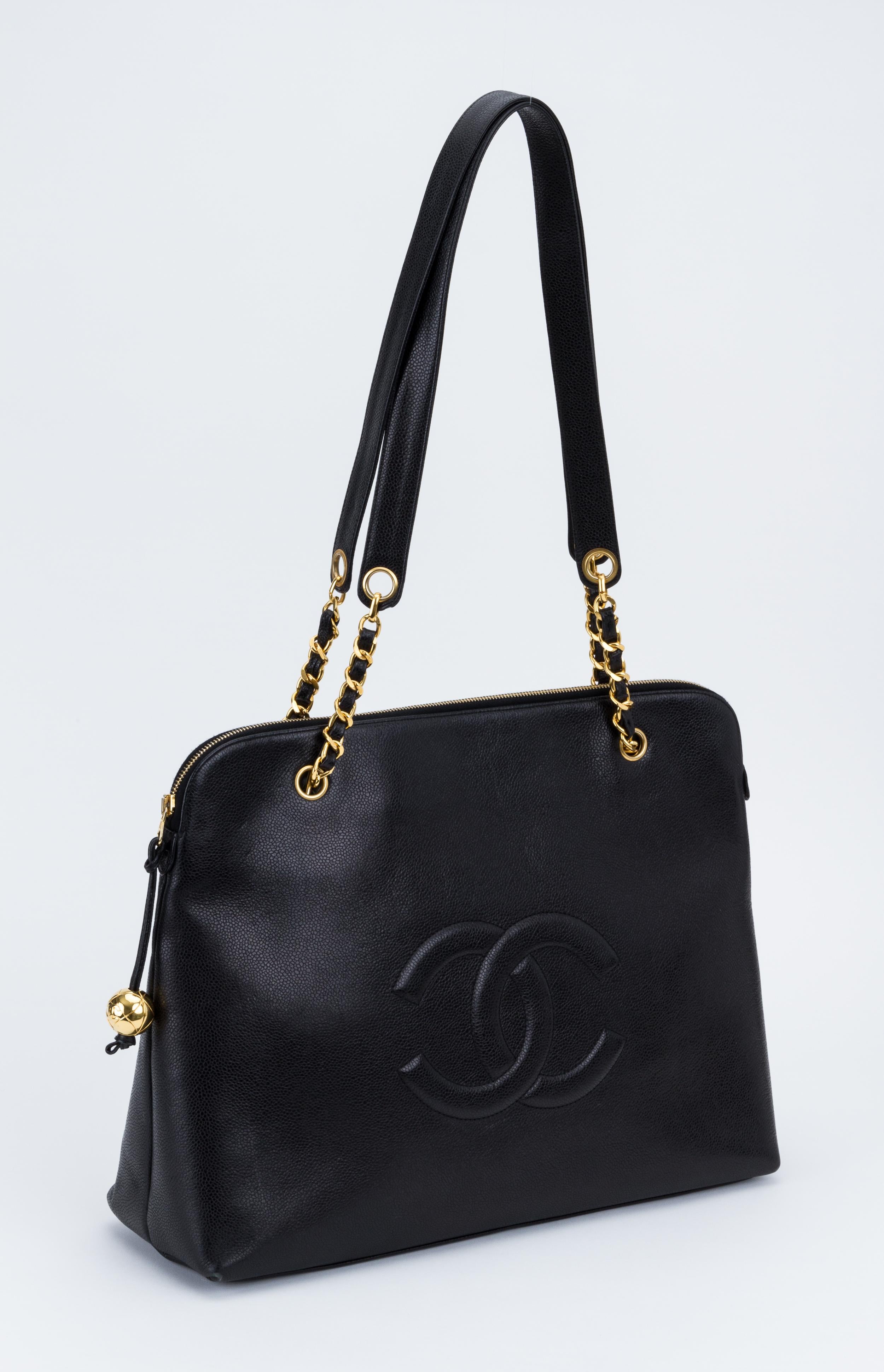Chanel 90s large shoulder tote, travel collection. Black caviar leather and yellow gold hardware. Shoulder drop 15