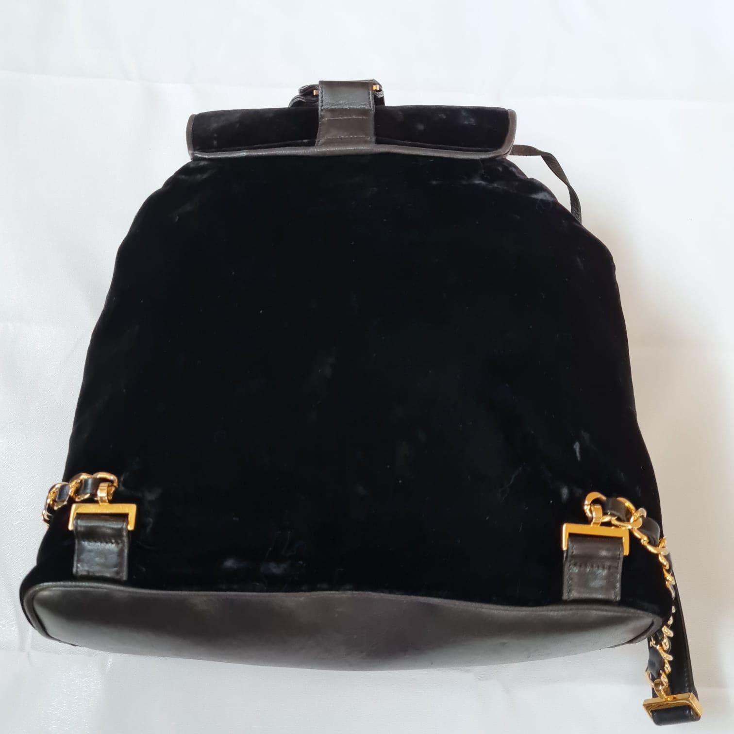 Women's or Men's 1990s Vintage Chanel Black Velvet Drawstring CC Backpack