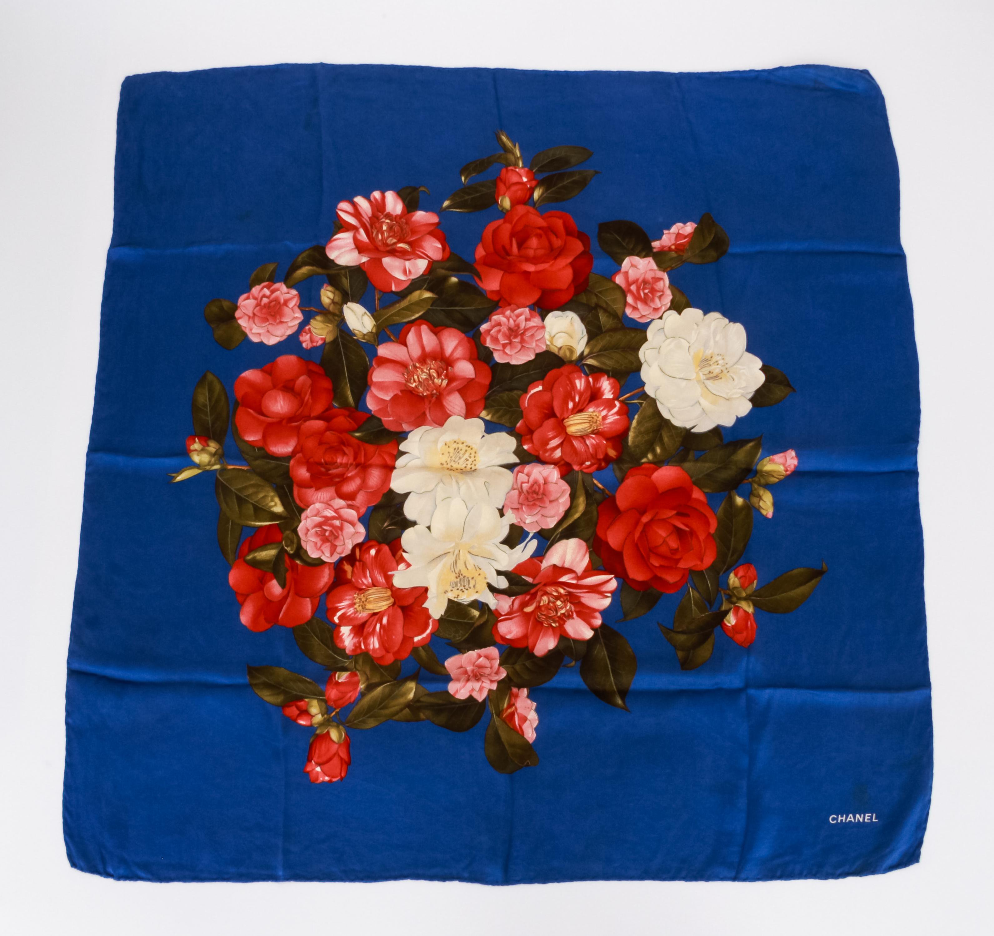 Chanel vintage electric blue silk scarf with pink and red flower bouquet design.
35