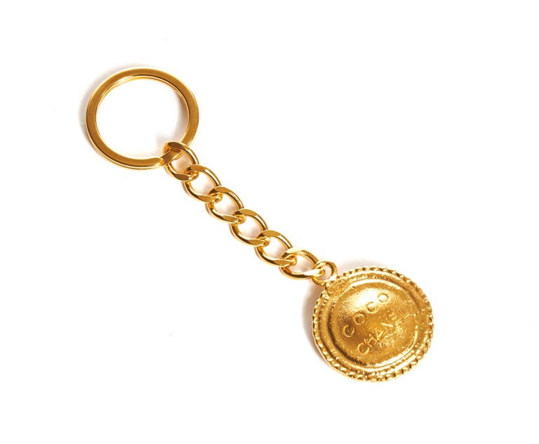 1990's Vintage Chanel Gold Coin Keychain at 1stDibs