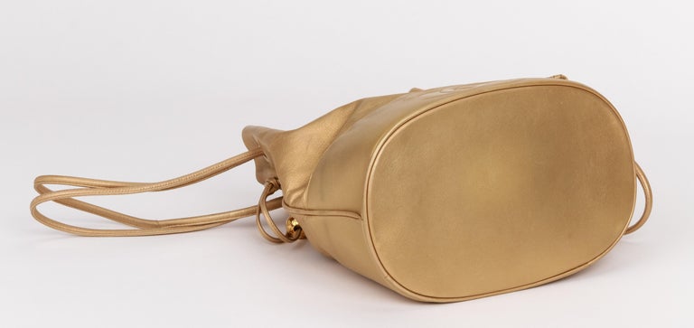 1990's Vintage Chanel Gold Lambskin Bucket Bag For Sale at 1stDibs
