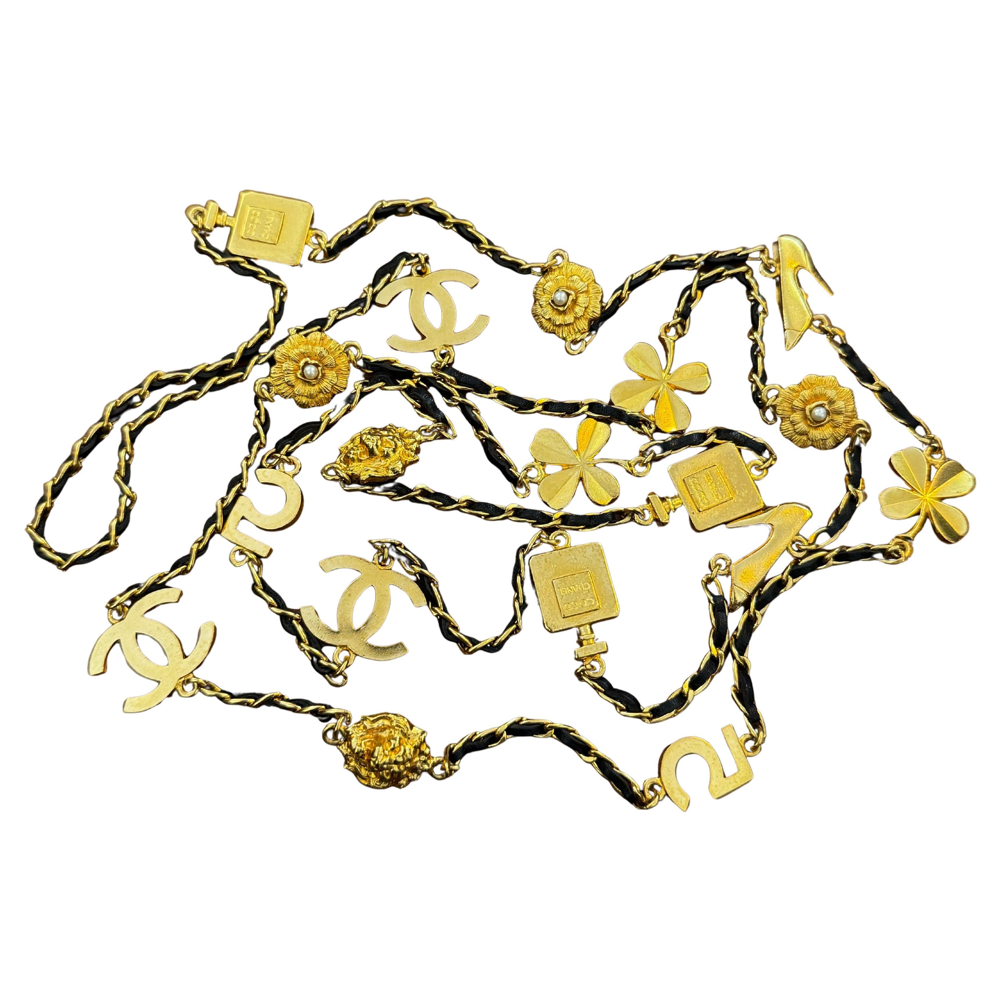 1990s Vintage CHANEL Gold Toned Long Chain Necklace CC No.5 Camellia Lion Clover