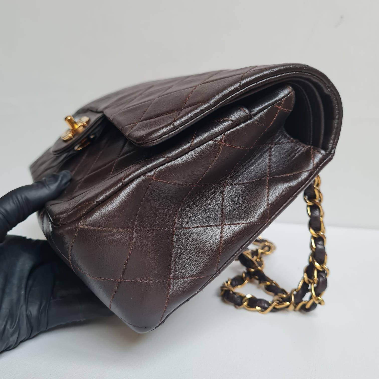 Women's or Men's 1990s Vintage Chanel Medium Dark Brown Leather Flap Bag