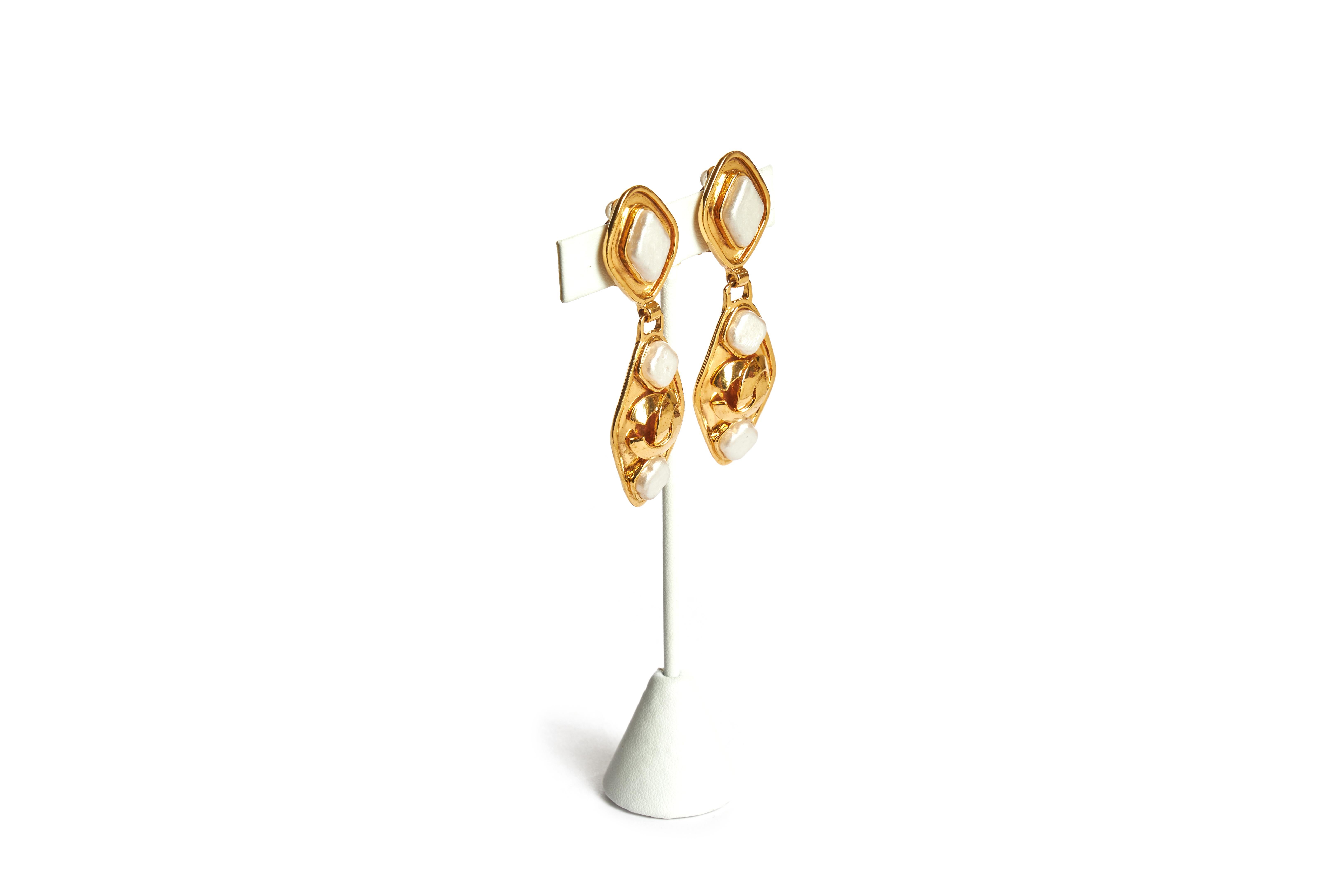 Chanel long diamond shape dangle earrings with faux pearls. Collection spring 95. Come with original dust cover or box.