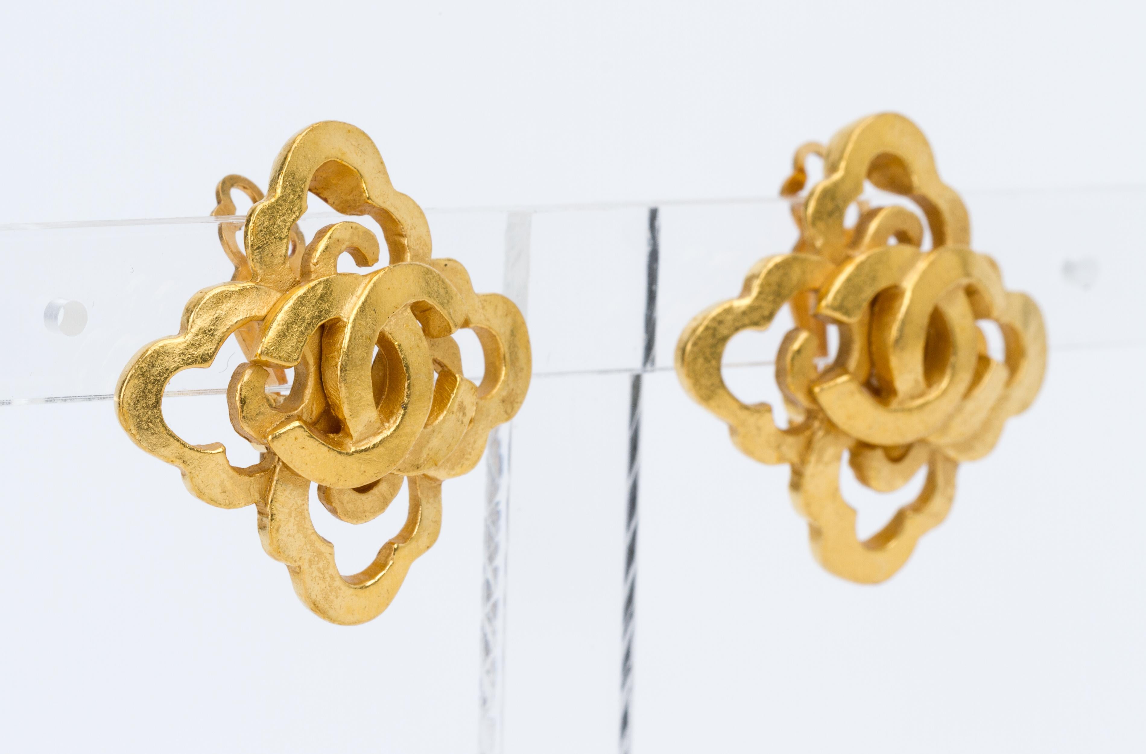 Chanel satin gold logo cc clover clip earrings. Spring 97 collection. Come with velvet pouch.