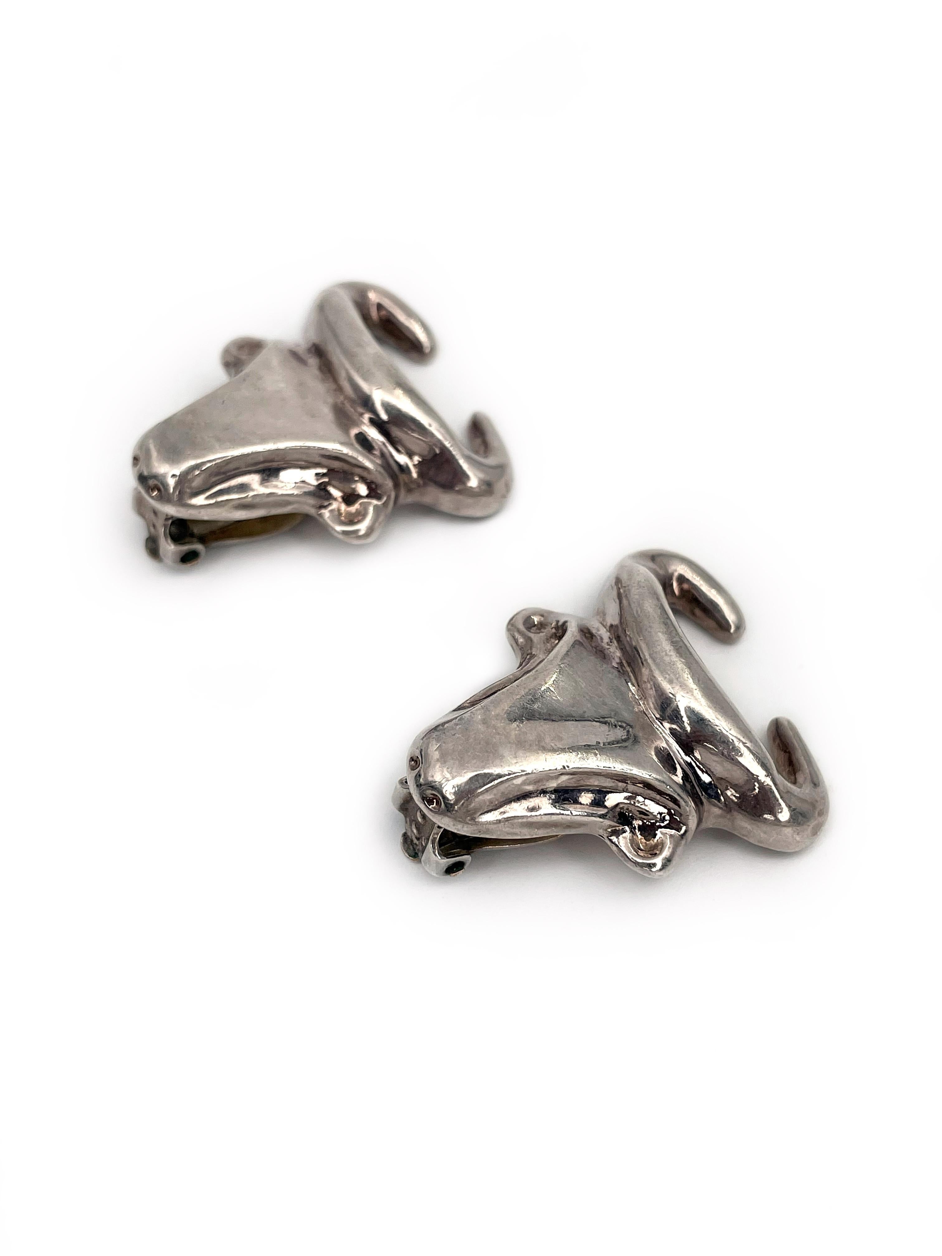 This is a pair of an iconic silver tone large bull head clip on earrings designed by Christian Lacroix in 1990’s. The piece is silver plated. 

Worth of attention of any stylish person. 

Markings: “Christian Lacroix - CL - Made in France”.

Size: