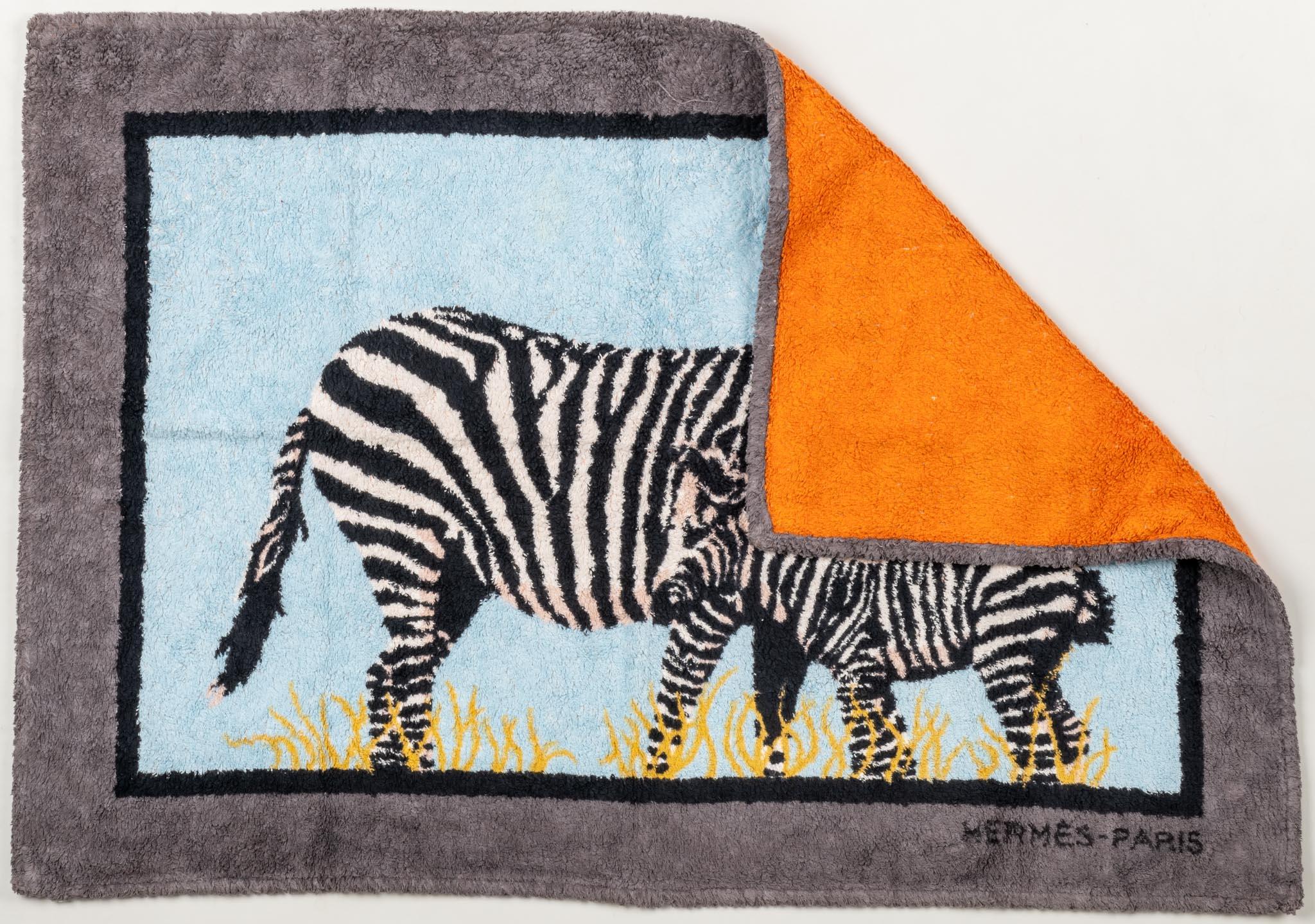 Very collectible bathroom rug , 100% cotton terry cloth with zebra design.