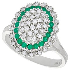 1990s Vintage Diamond and Emerald White Gold Cocktail Ring 1990s Vintage Diamond and Emerald White Gold Cocktail Ring