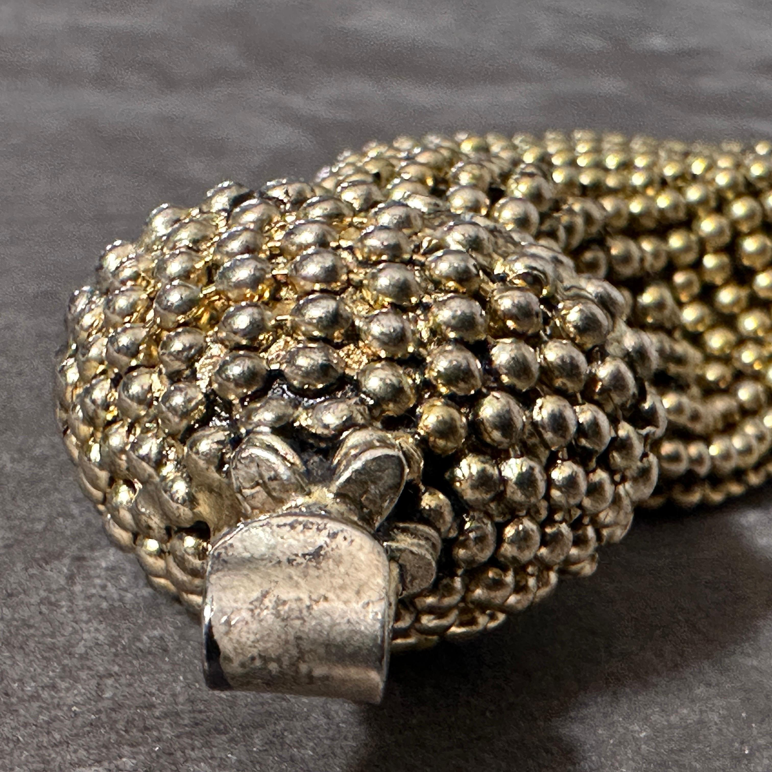 Women's 1990s Vintage Gilded Metal Bracelet by Giorgio Armani For Sale