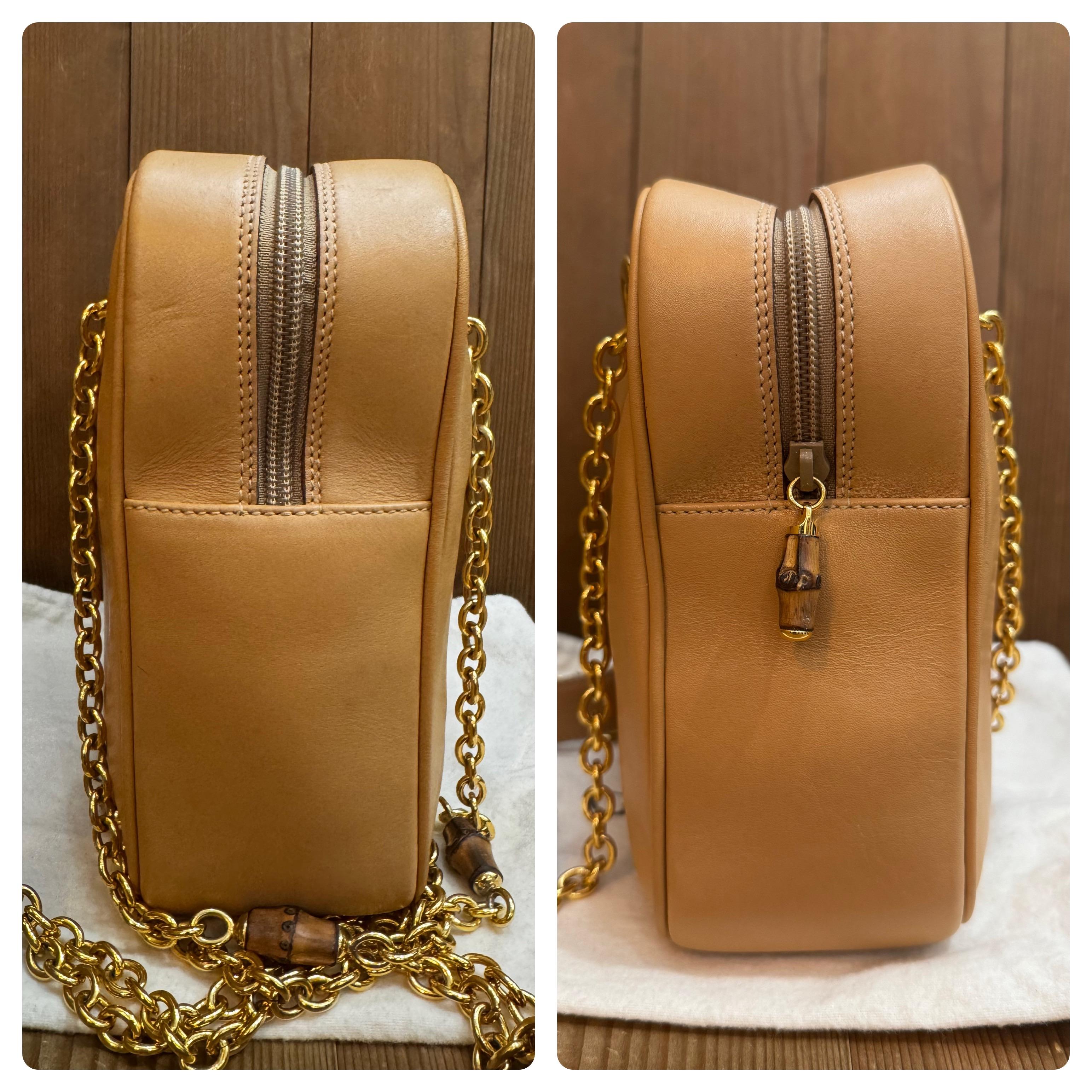 This vintage GUCCI bamboo chain crossbody bag is crafted of smooth calfskin leather in beige featuring four sturdy gold toned chain with bamboo internodes. Top zipper closure opens to a coated interior which has been professionally cleaned featuring